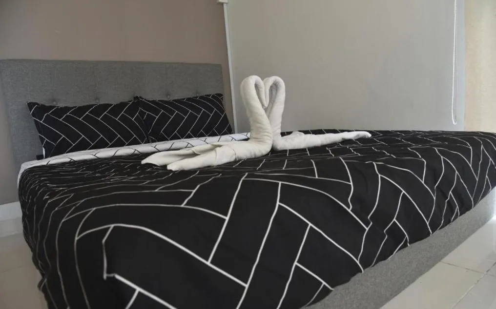 Bed in Regalia Residence KLCC View by iLuxHome