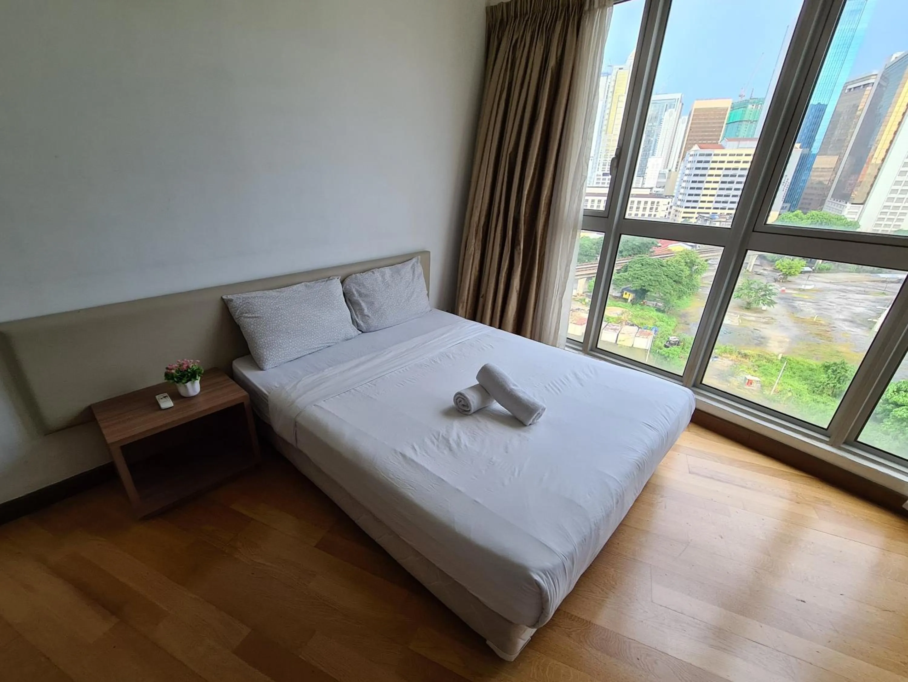 Bed in Regalia Residence KLCC View by iLuxHome