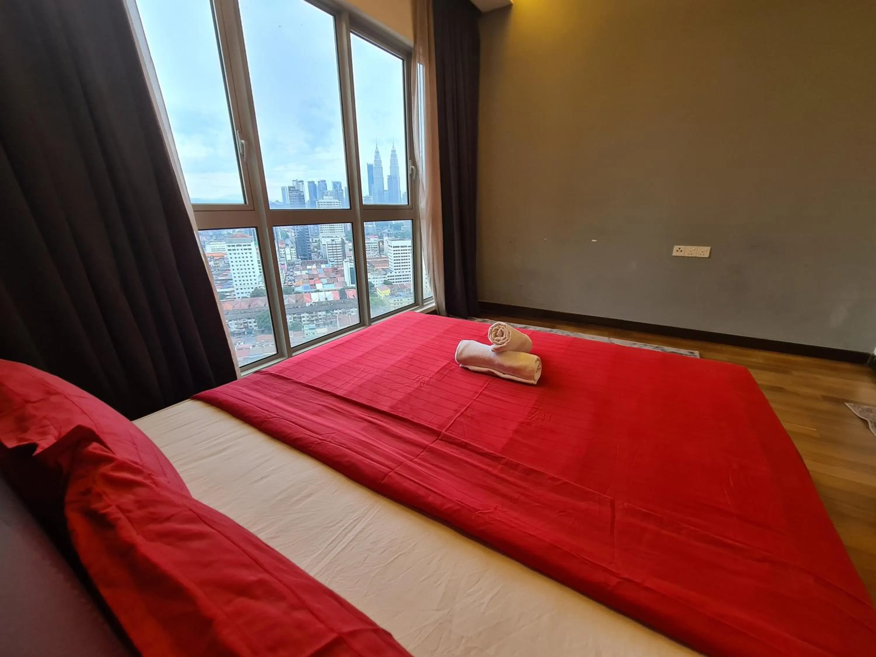 Bed in Regalia Residence KLCC View by iLuxHome