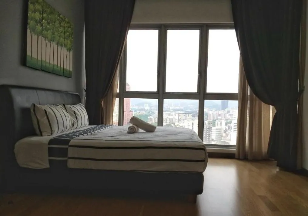 Bed in Regalia Residence KLCC View by iLuxHome