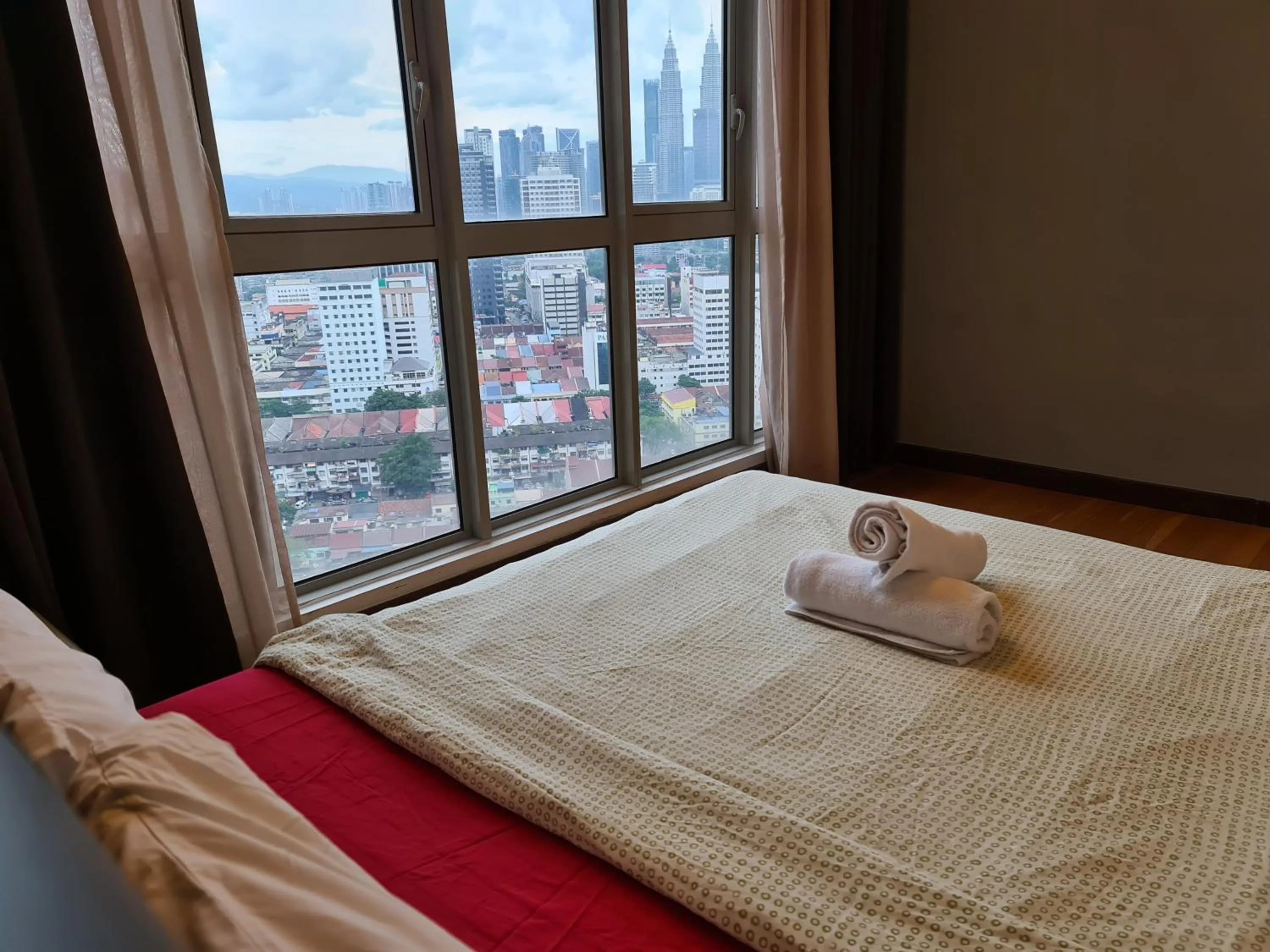 Bed in Regalia Residence KLCC View by iLuxHome