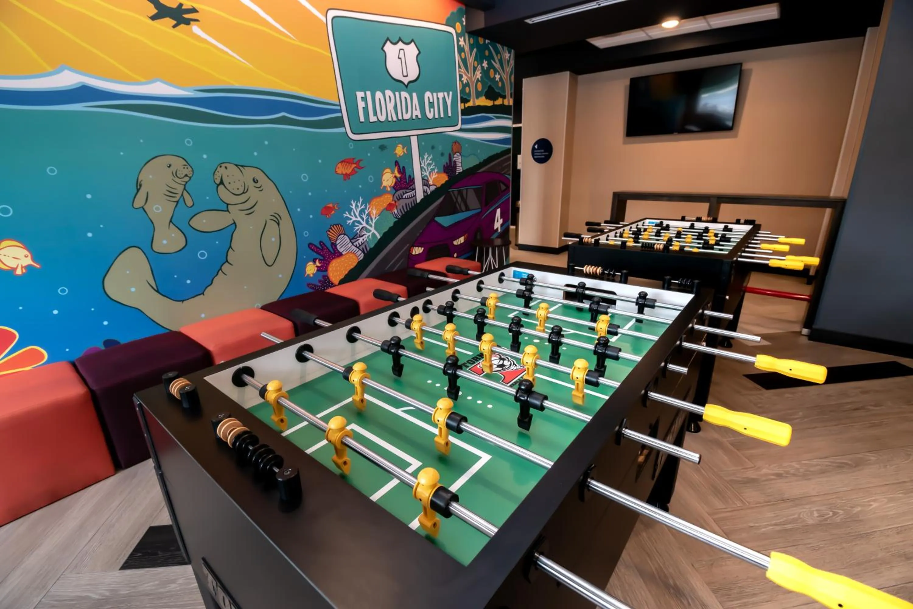 Communal lounge/ TV room in Tru By Hilton Florida City, Fl