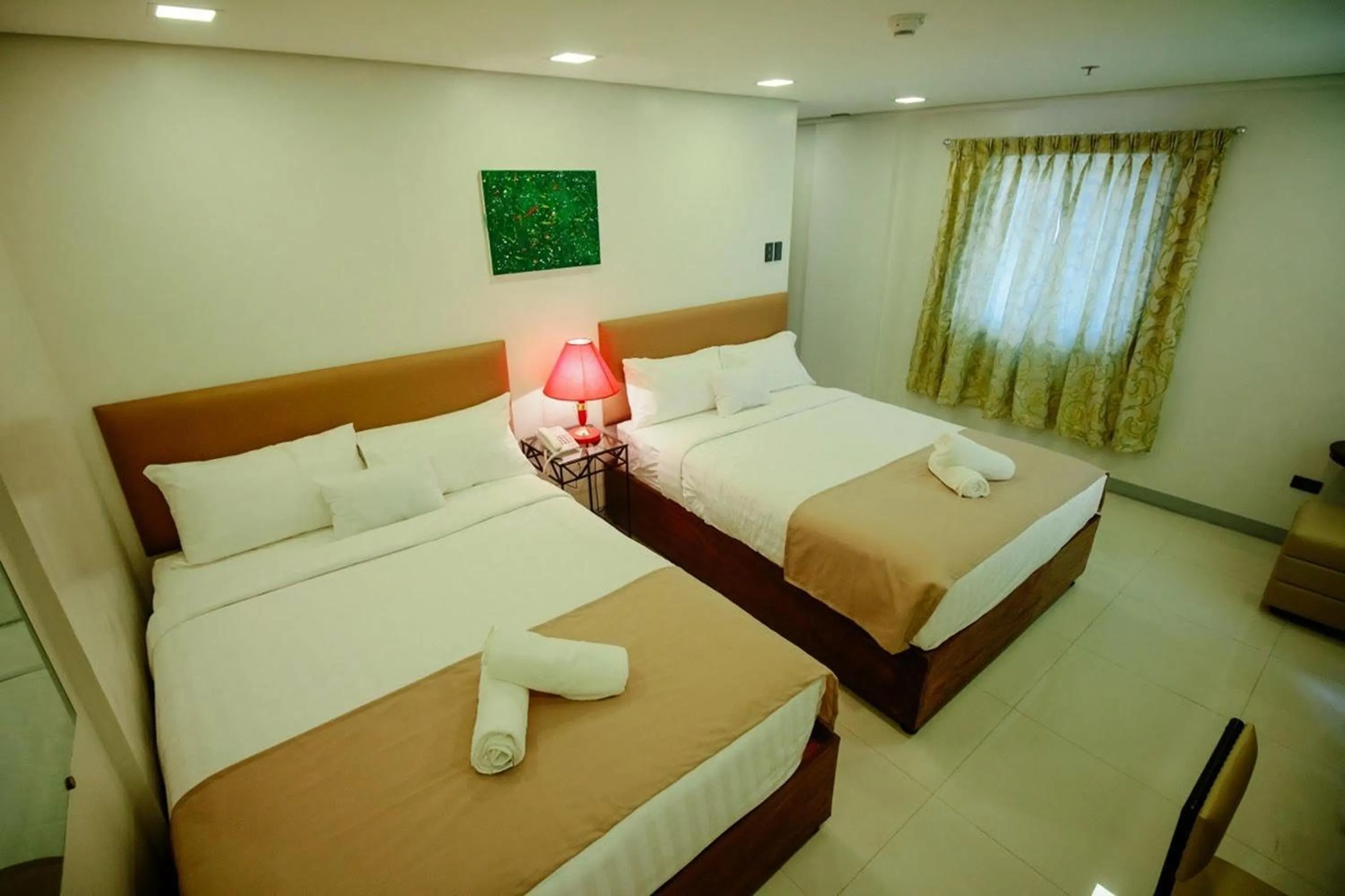 Photo of the whole room, Bed in Belltower CSheLi Suites Bantay - Vigan