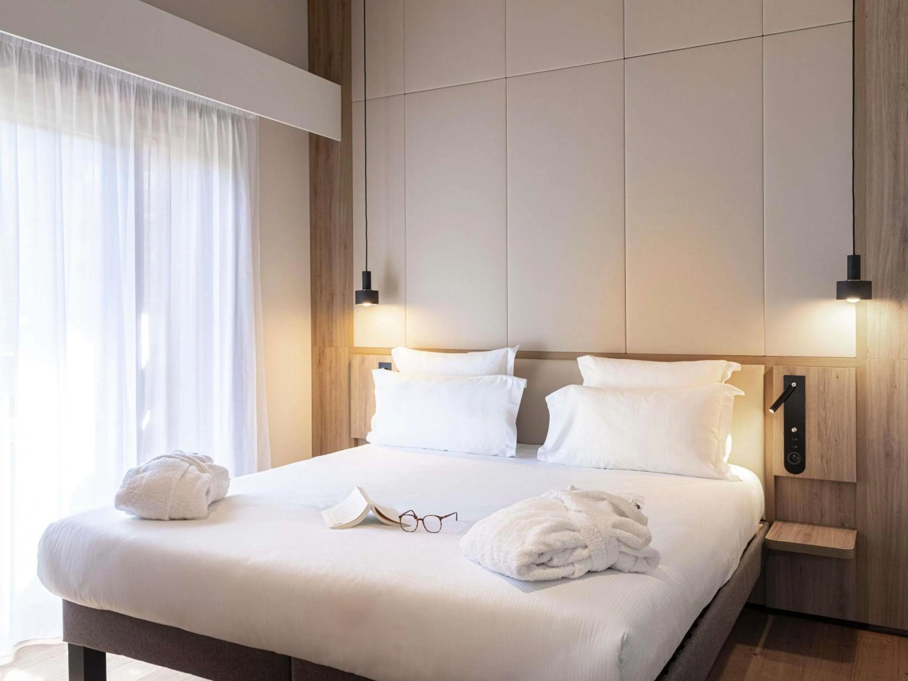 Bedroom, Bed in Novotel Megève Mont-Blanc