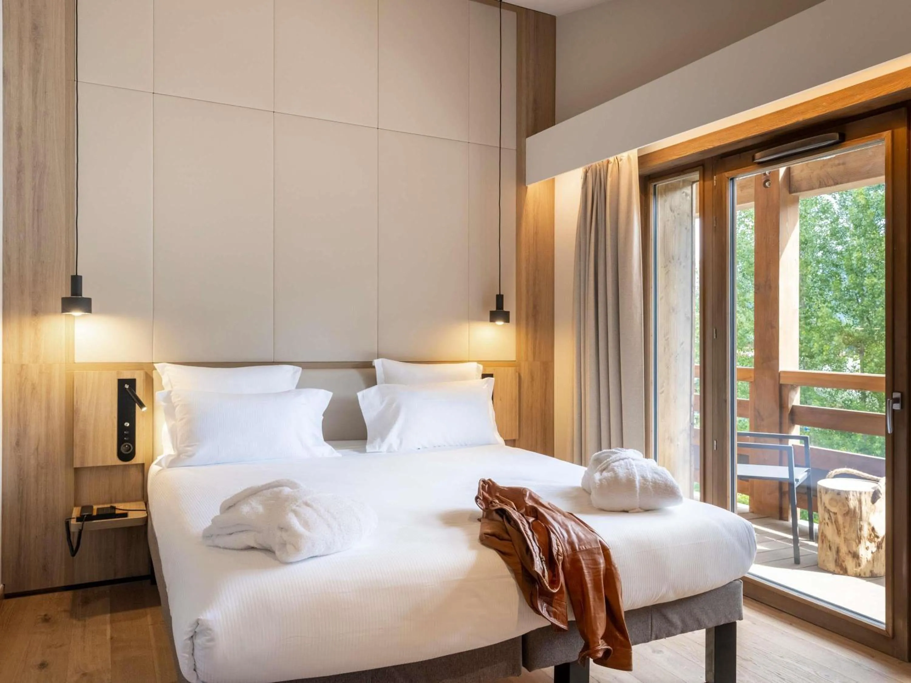 Bedroom, Bed in Novotel Megève Mont-Blanc