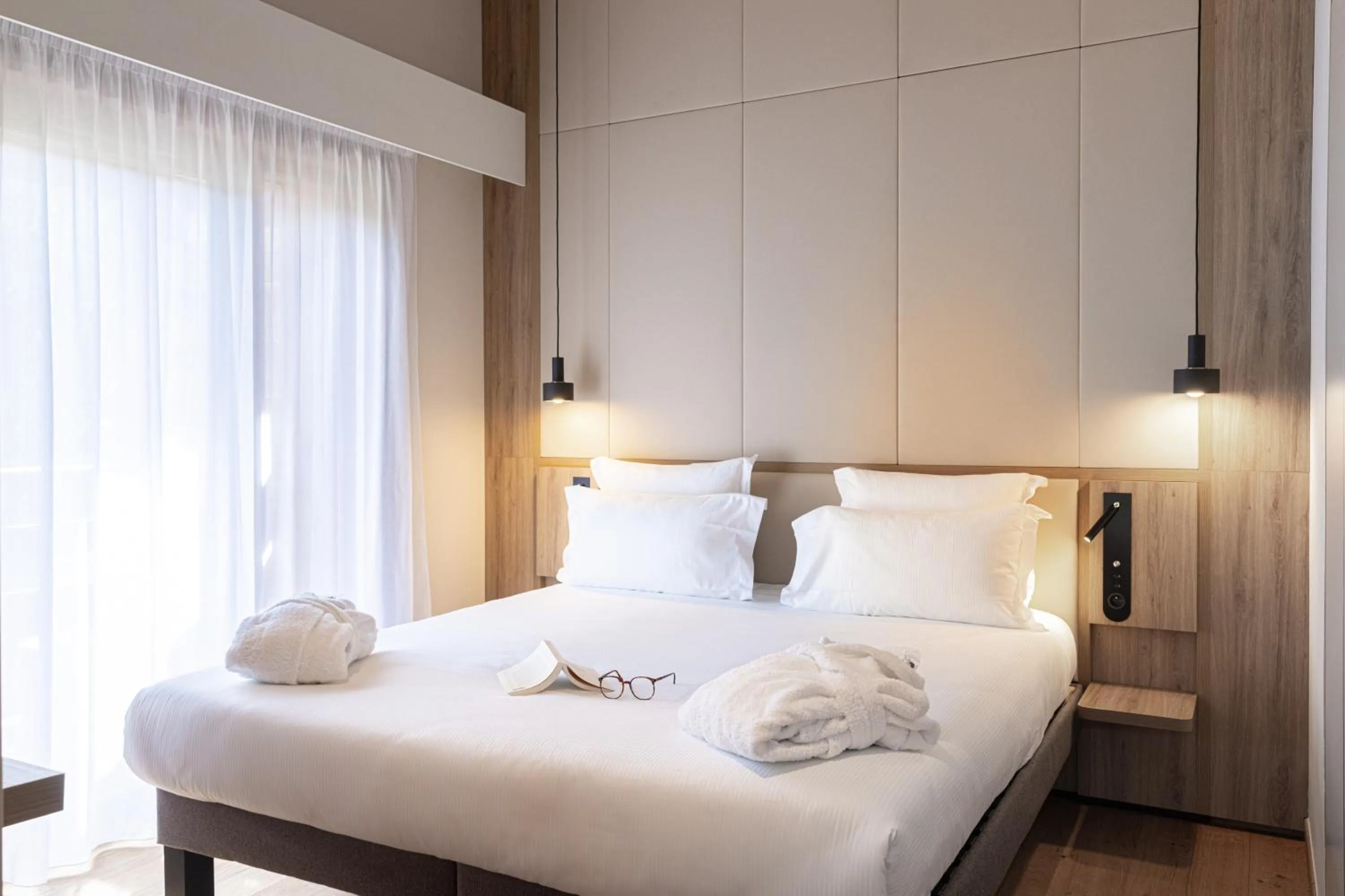 Bedroom, Bed in Novotel Megève Mont-Blanc