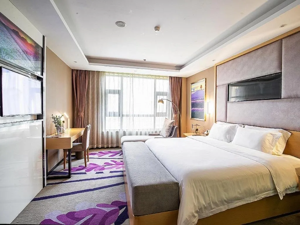 Bed in Lavande Hotel Leshan High-speed Railway Station Wanda Plaza