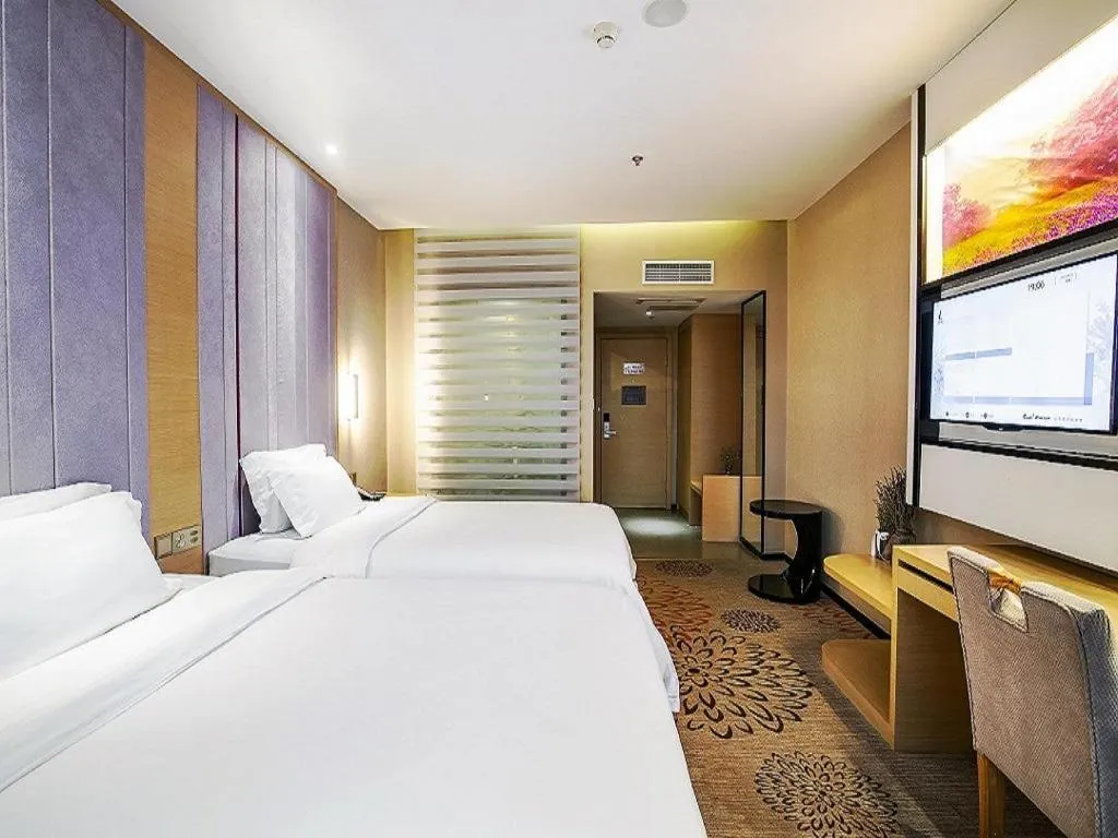 Bed in Lavande Hotel Leshan High-speed Railway Station Wanda Plaza