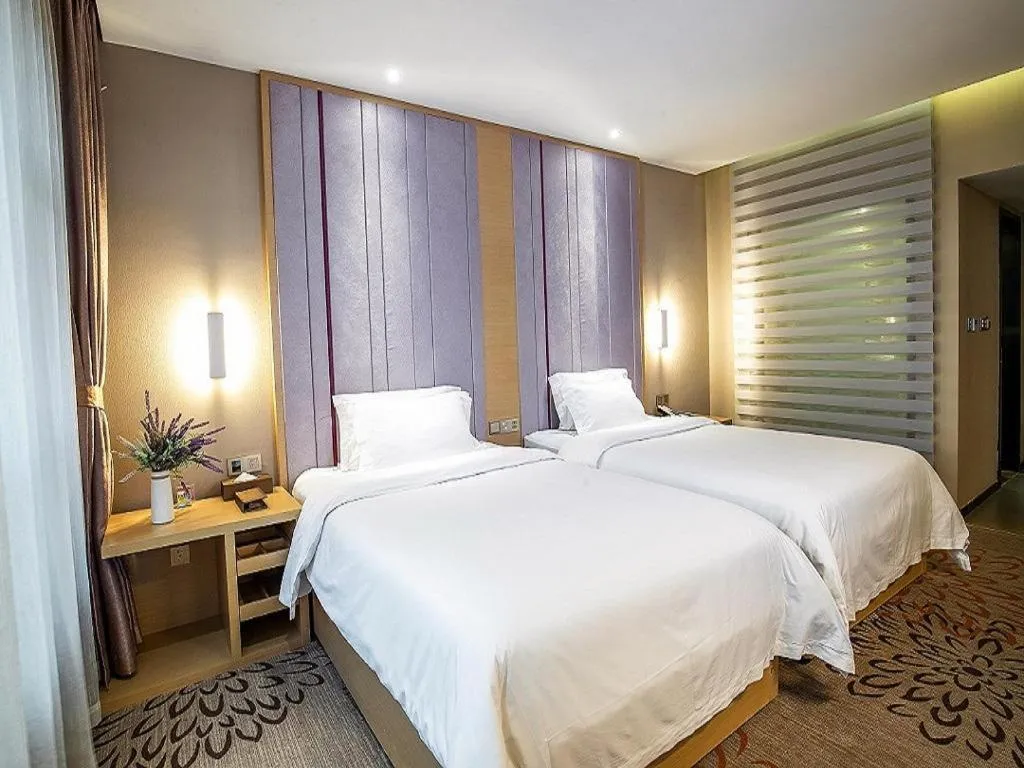 Bed in Lavande Hotel Leshan High-speed Railway Station Wanda Plaza
