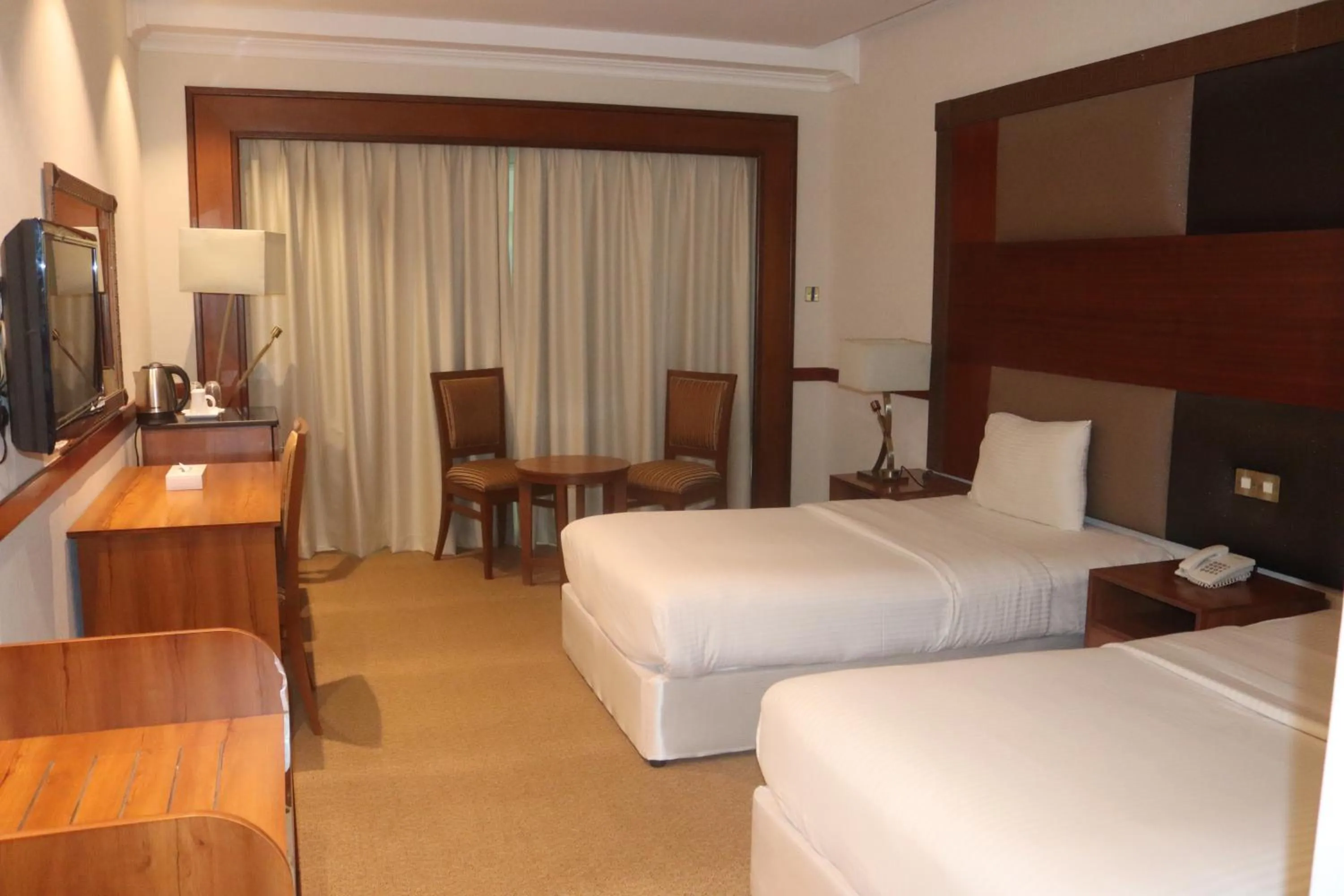 Photo of the whole room, Bed in GSS Avenue Hotel Ex Delmon Hotel