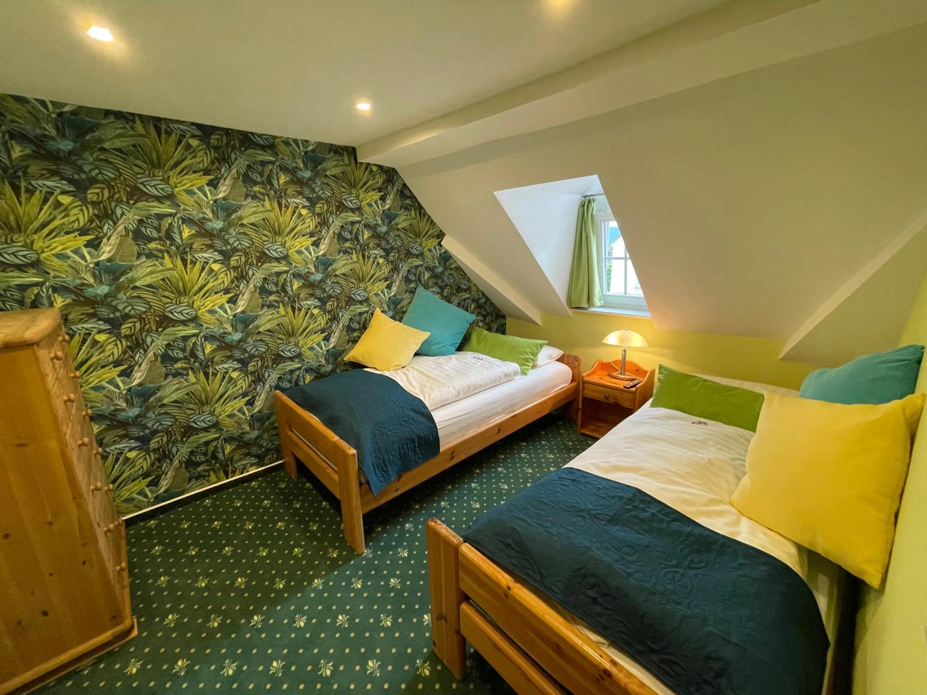 Bed in Hotel Garni Maaß