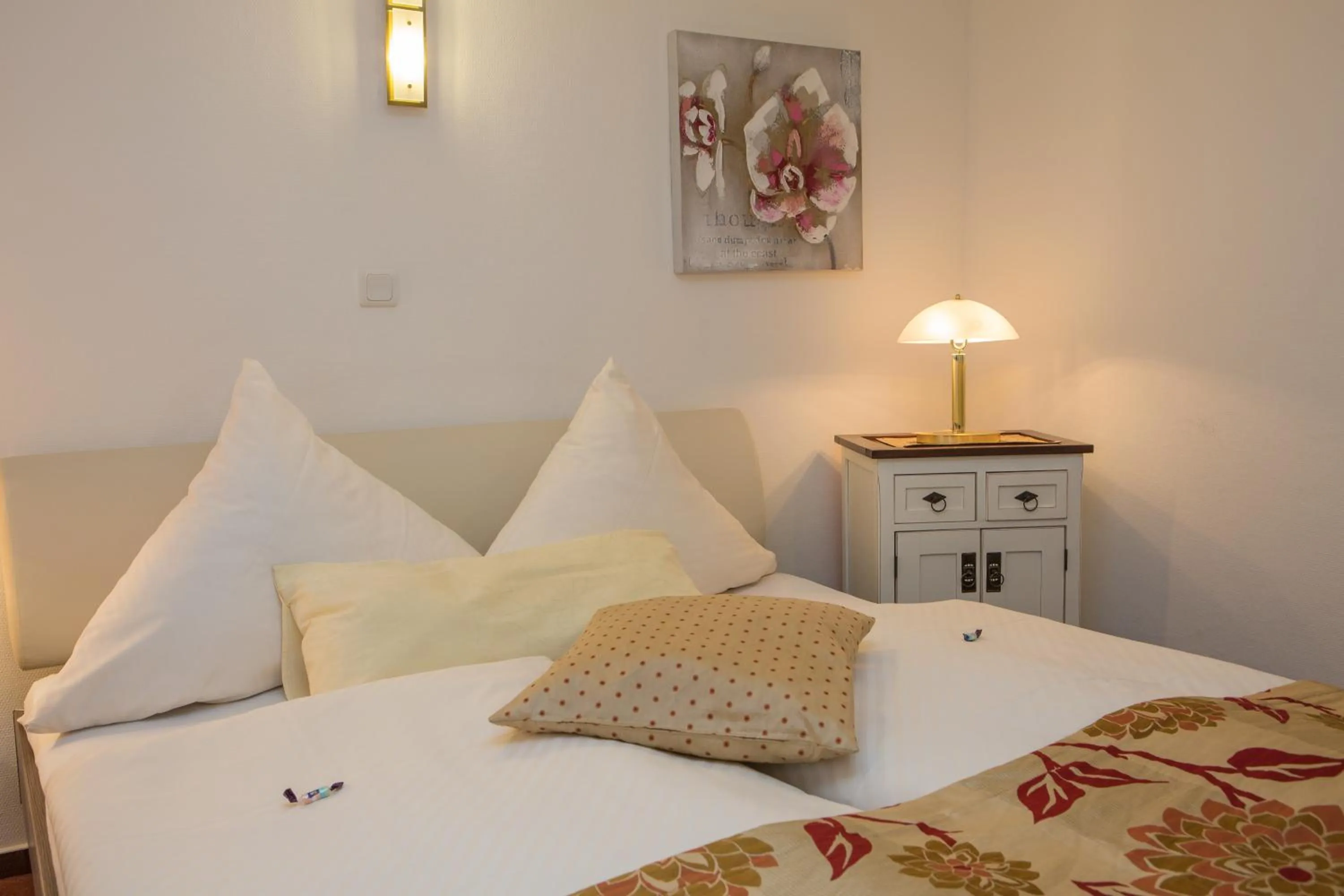 Bed in Hotel Garni Maaß