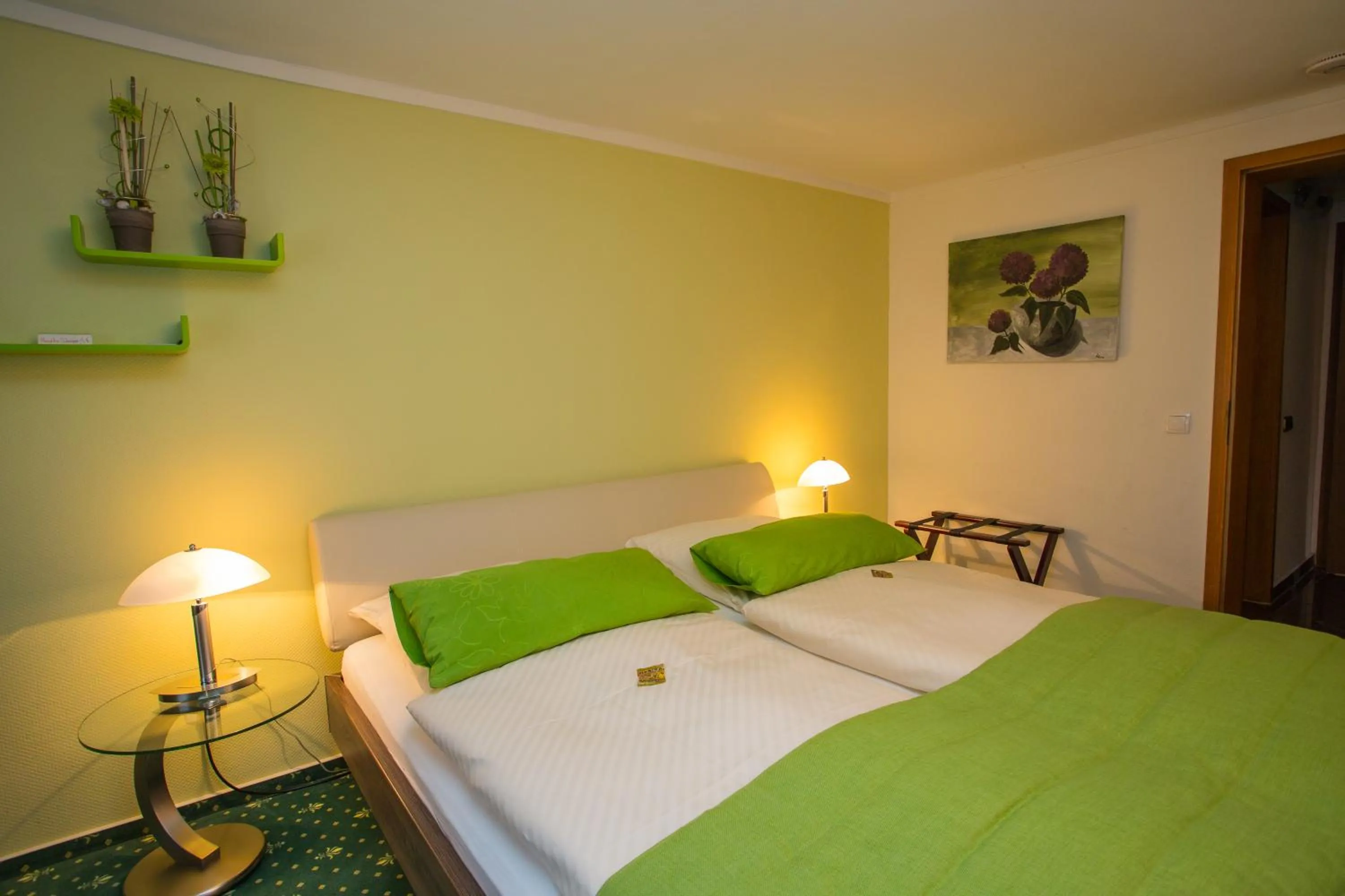 Bed in Hotel Garni Maaß