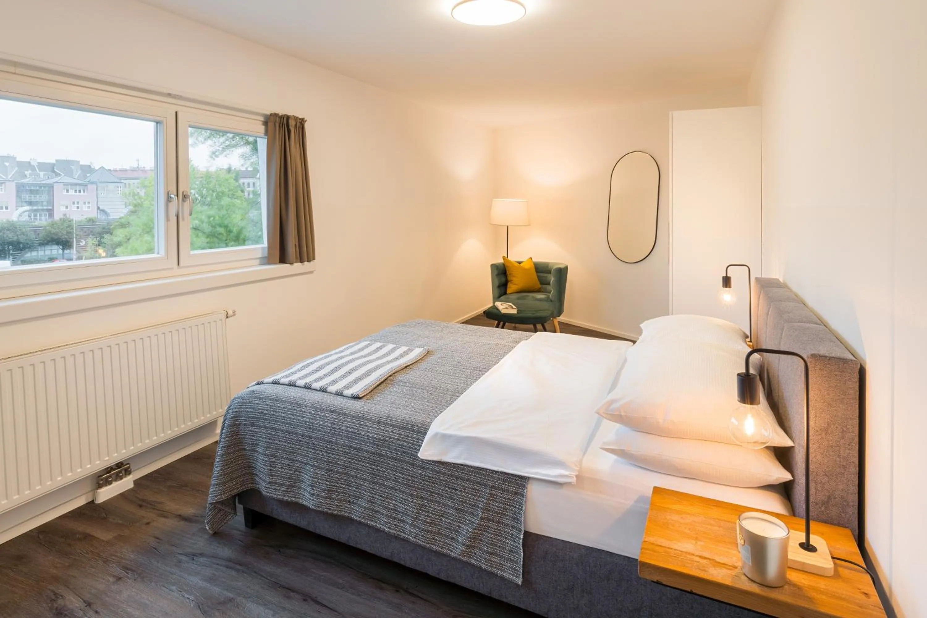 Bed in URBAN ISLAND I Riverside Apartments