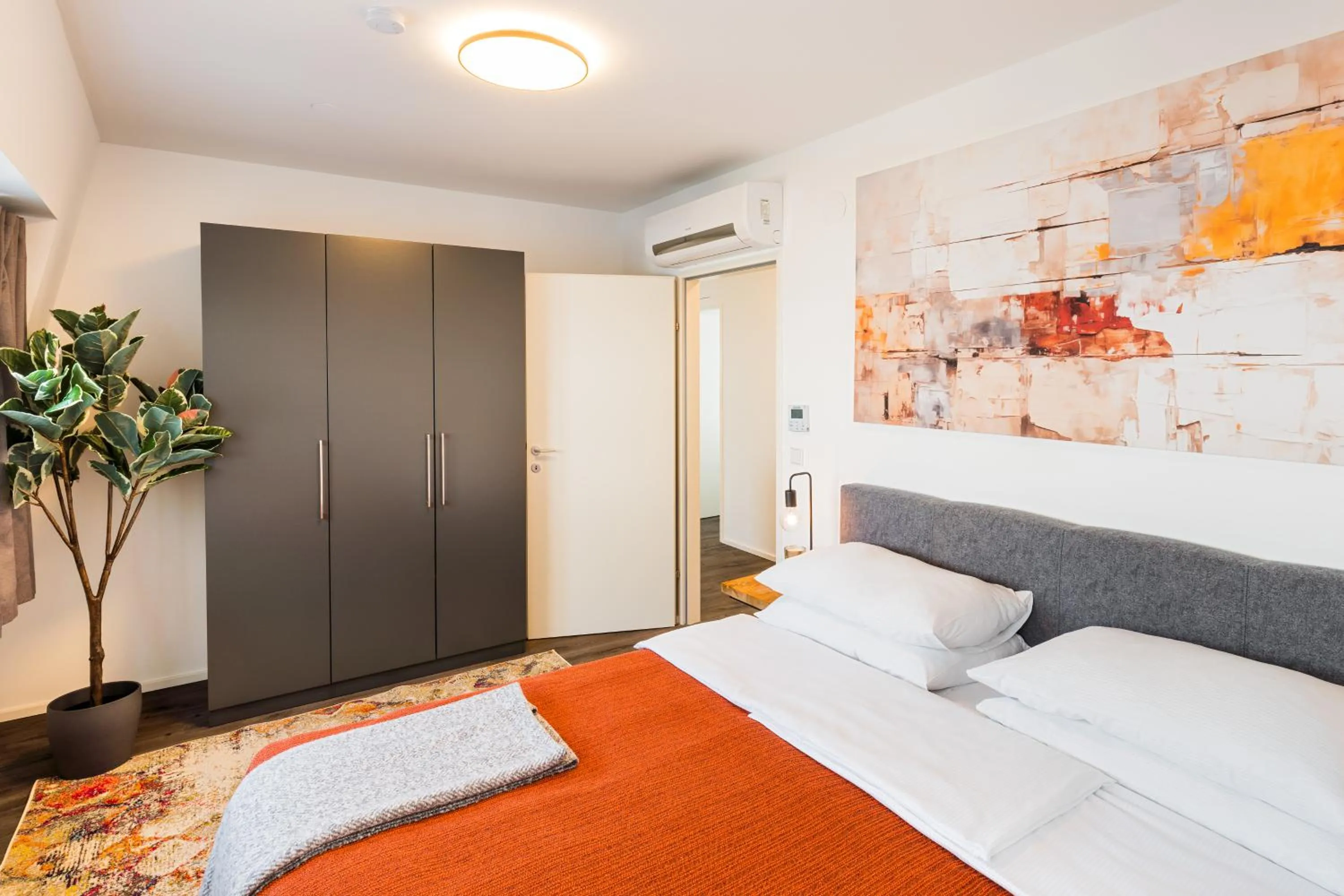 Bed in URBAN ISLAND I Riverside Apartments