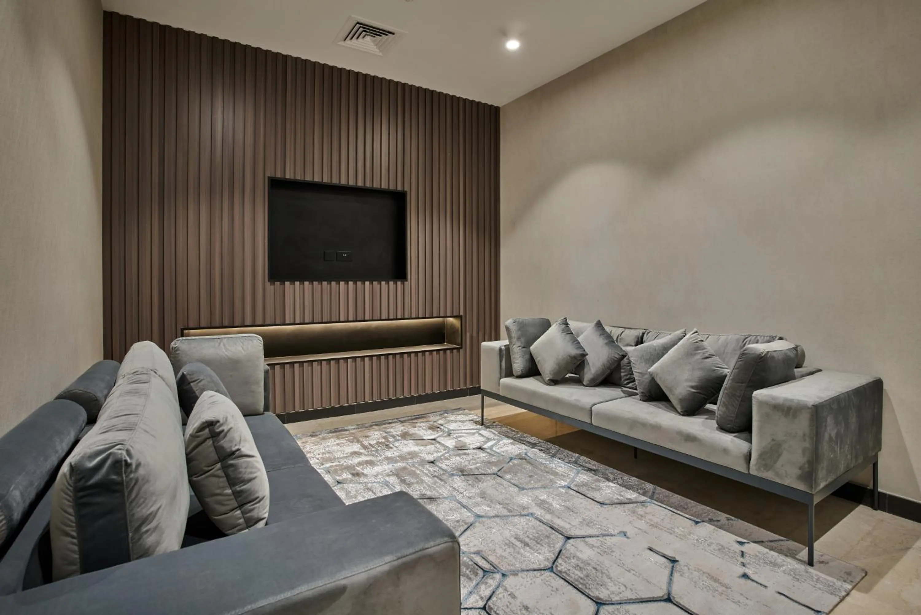 Seating area in Hotel Holiday International