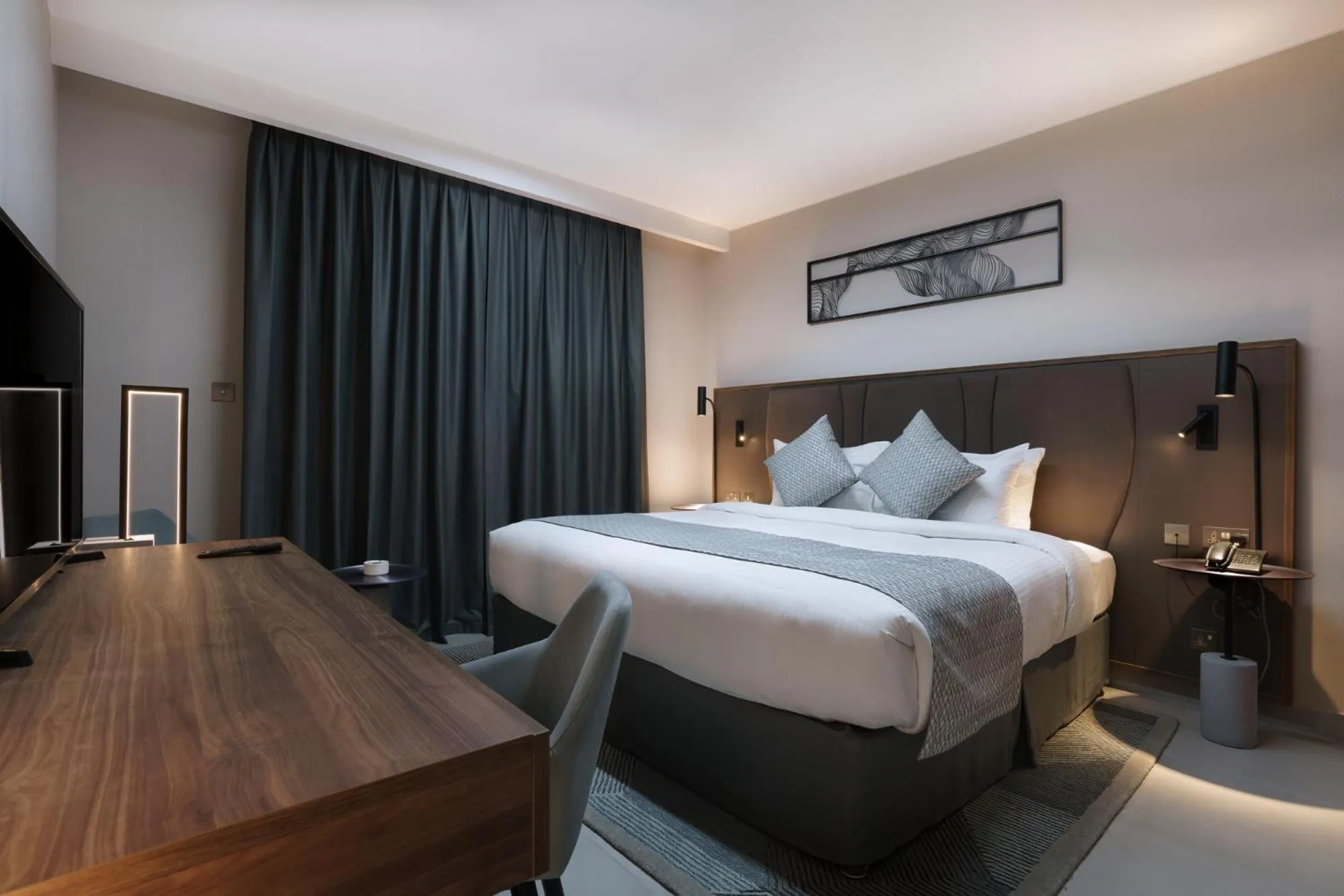 Bed in Hotel Holiday International