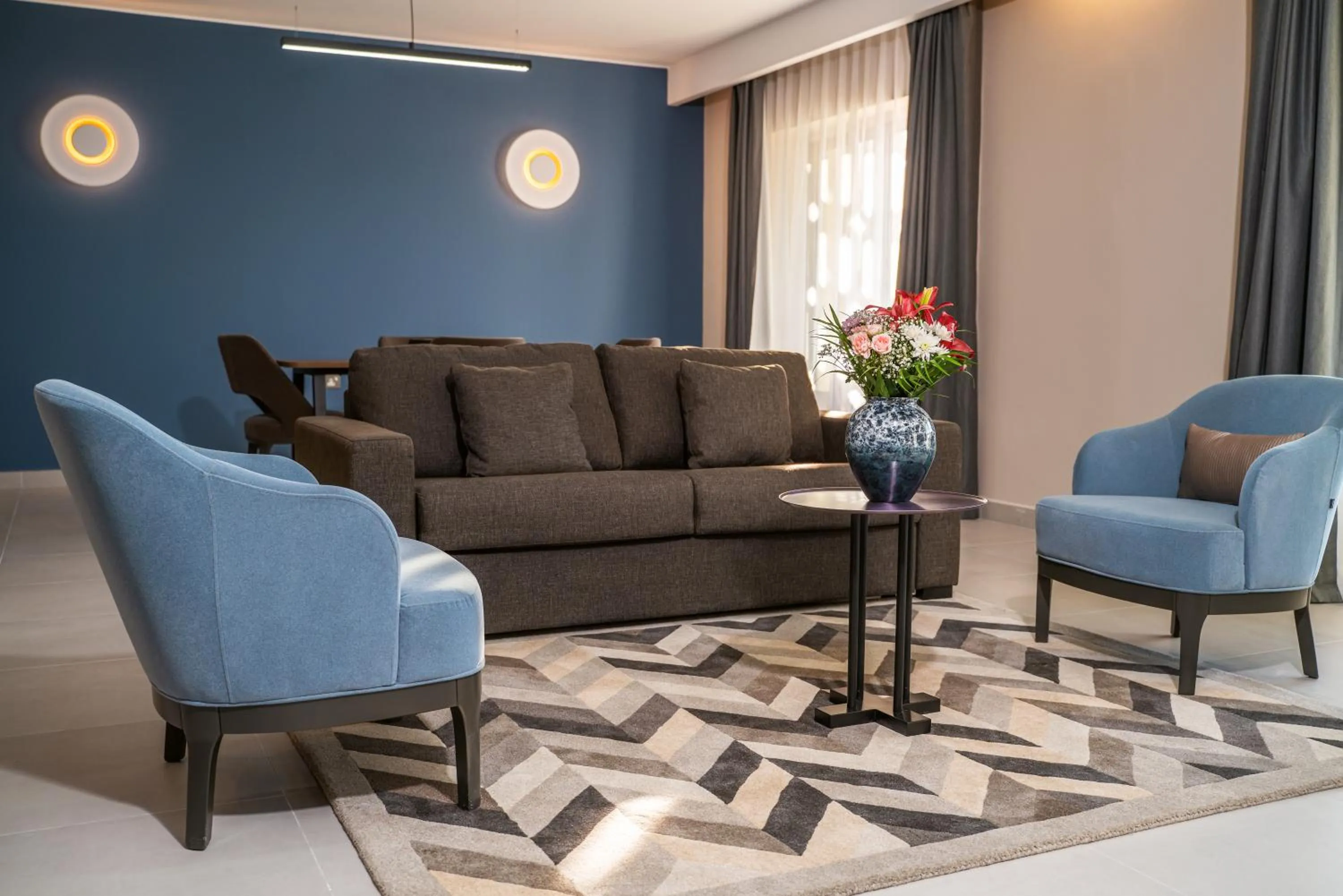 Living room in Hotel Holiday International