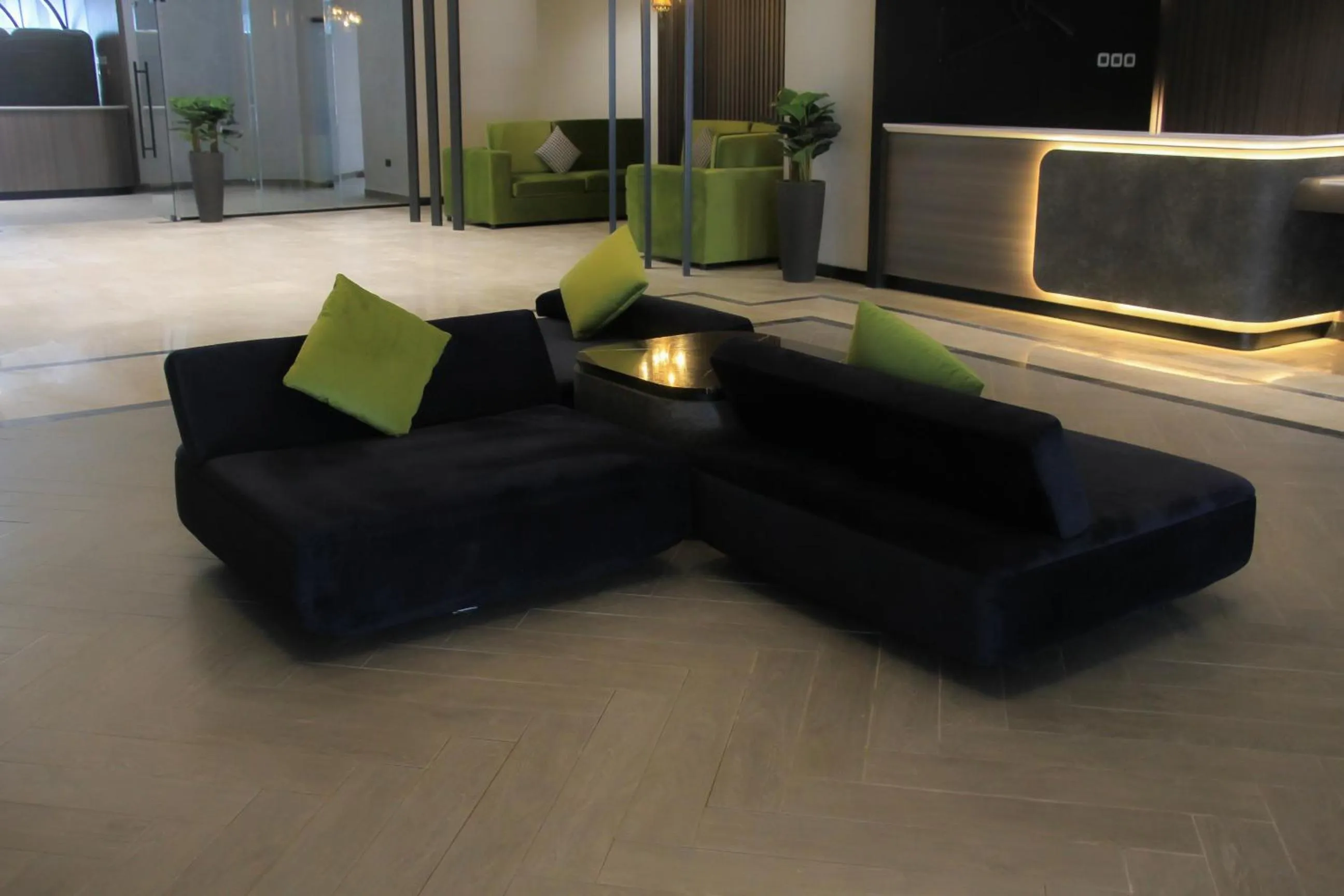 Seating area in Hotel Holiday International