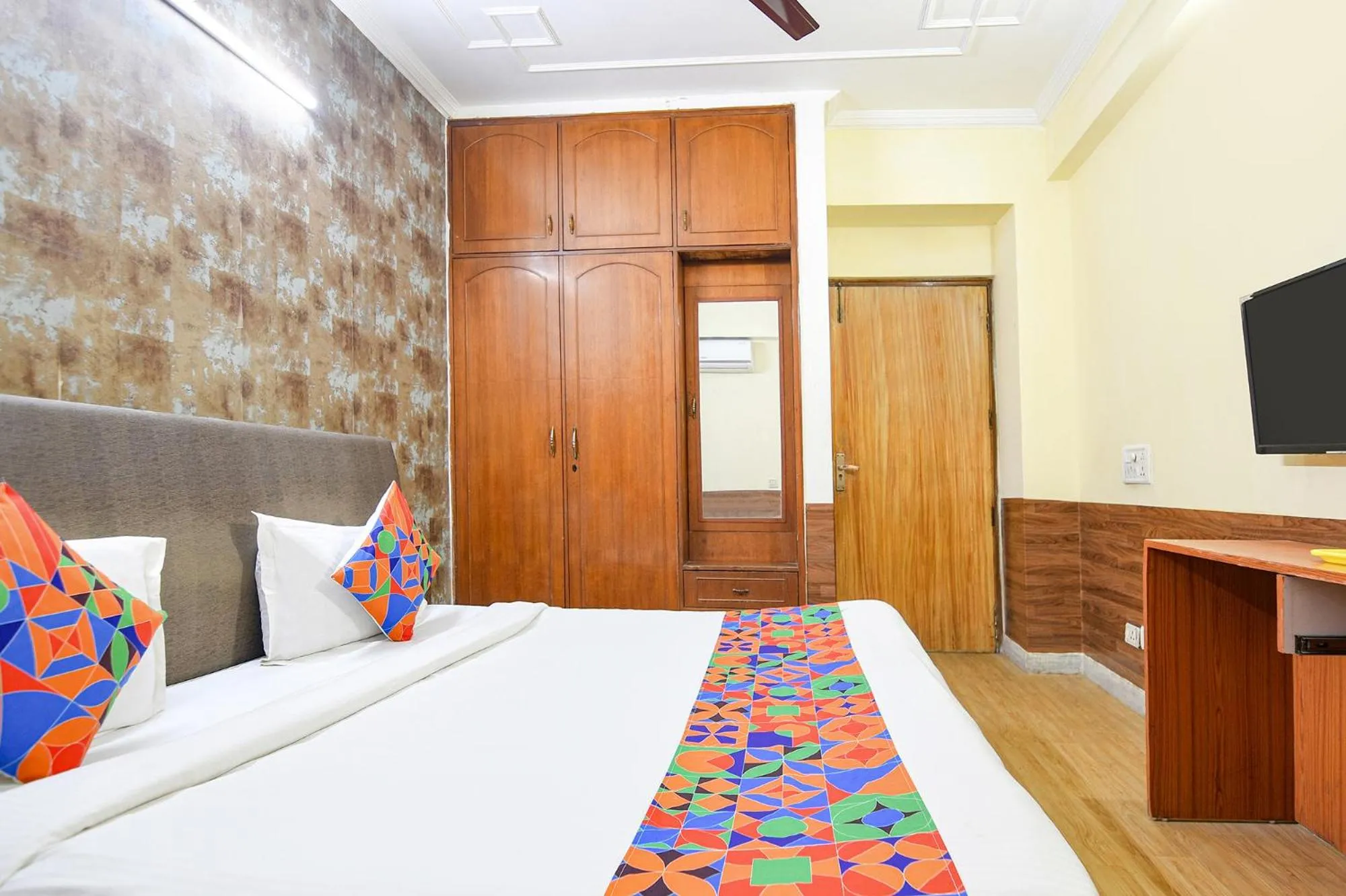 Bed in FabHotel Prime Praathana