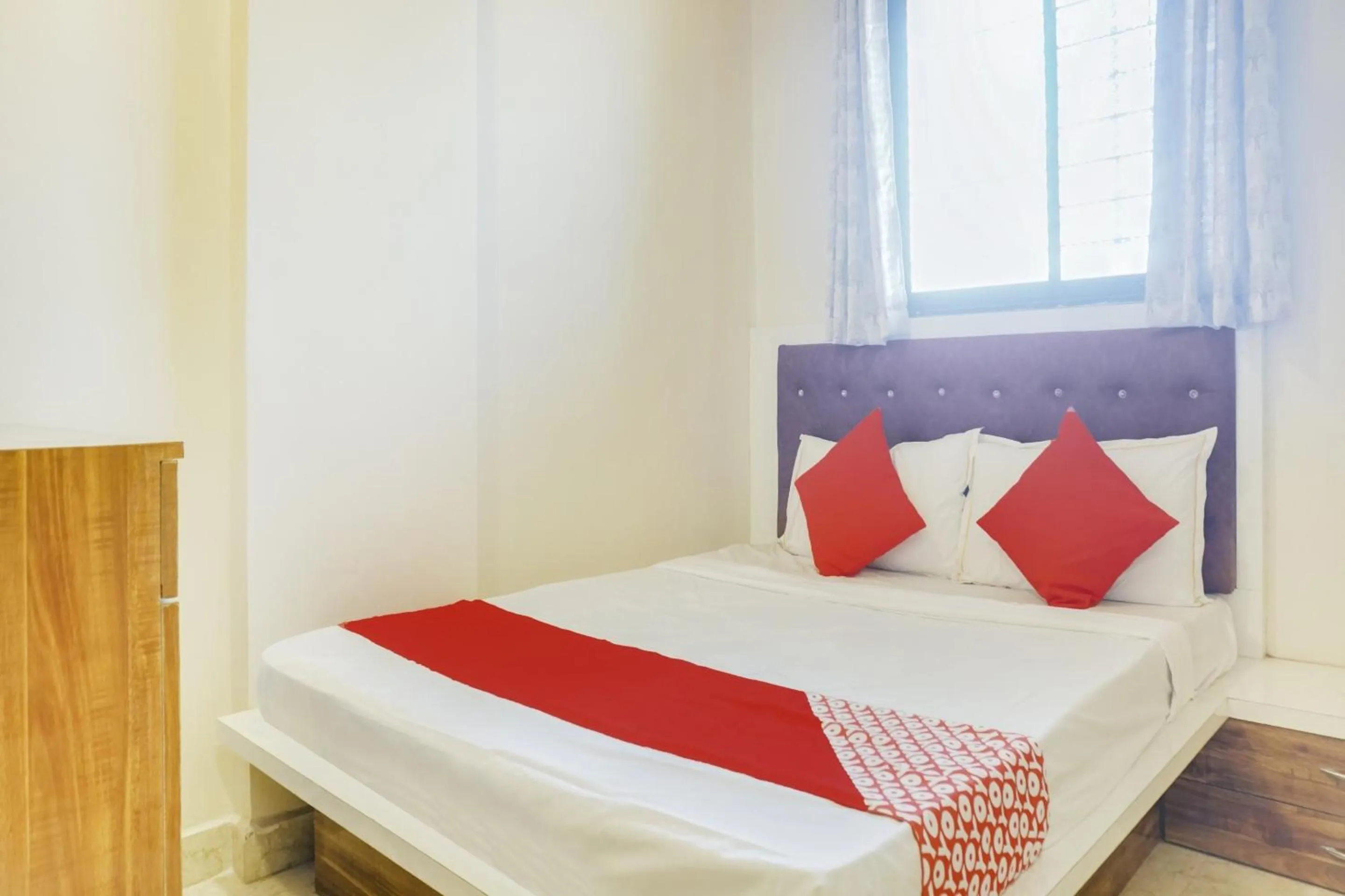 Bedroom in Hotel O Vijay Residency