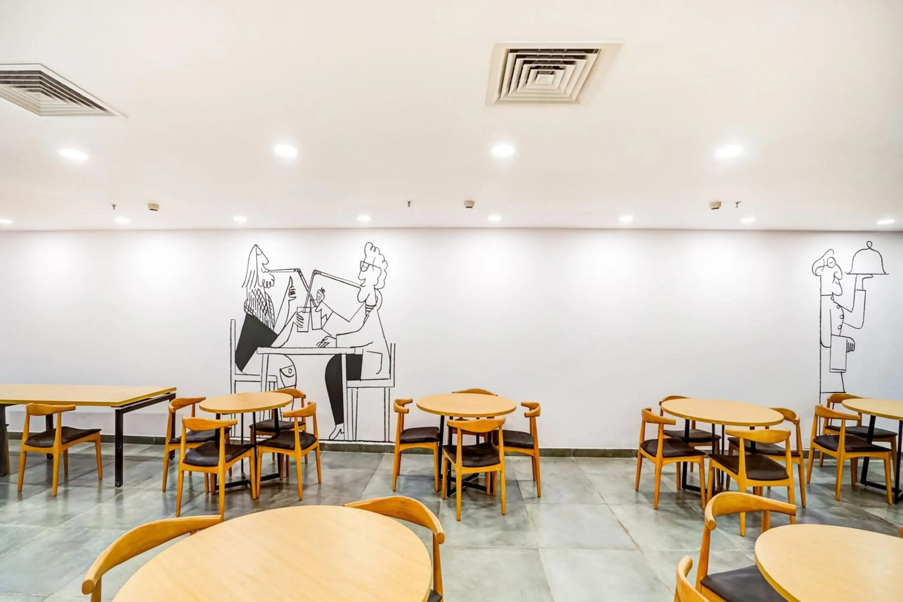 Dining area in Super Townhouse Sector 19 Fun Republic Mall Indiranagar