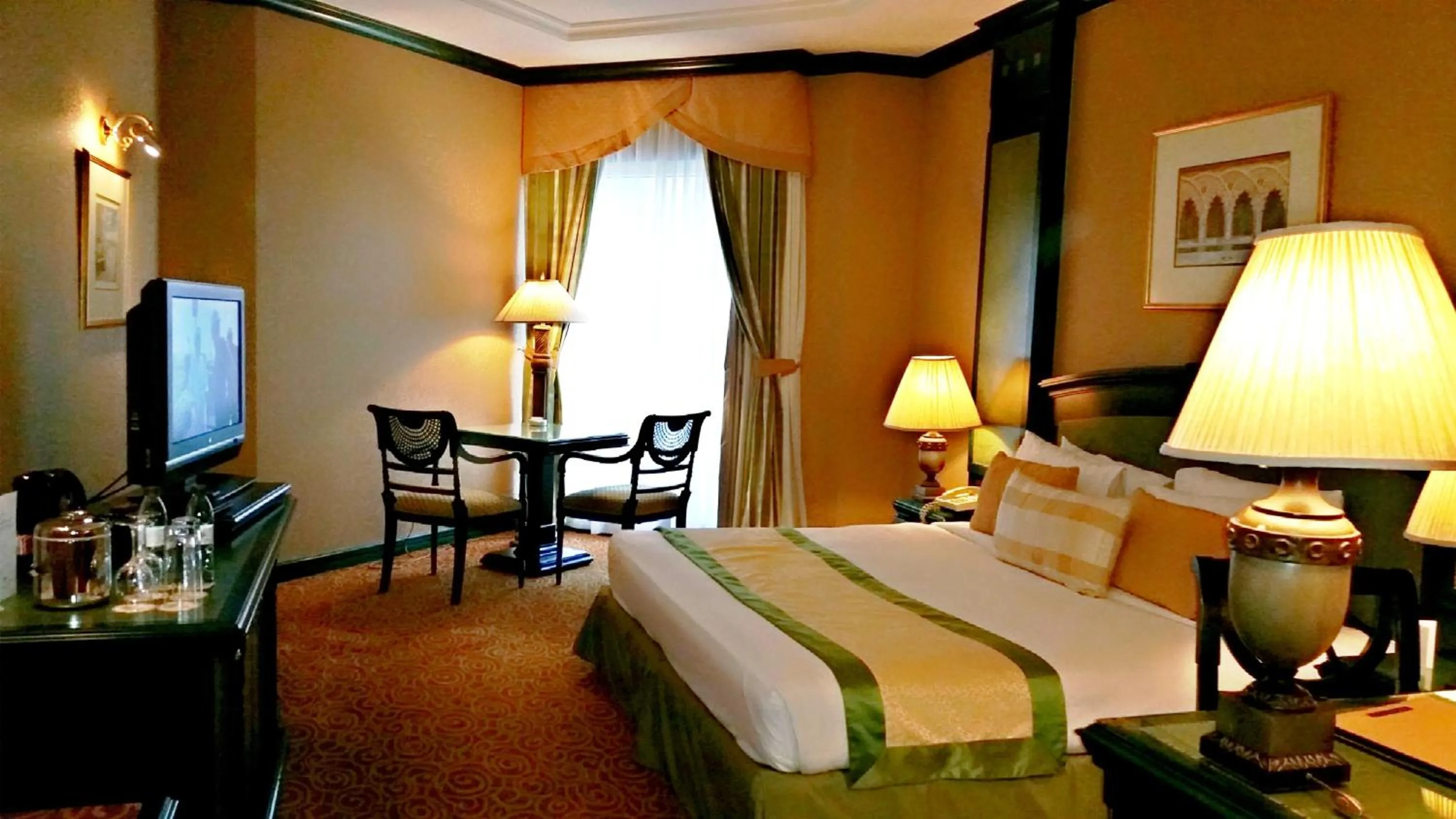 Bedroom in Carlton Palace Hotel