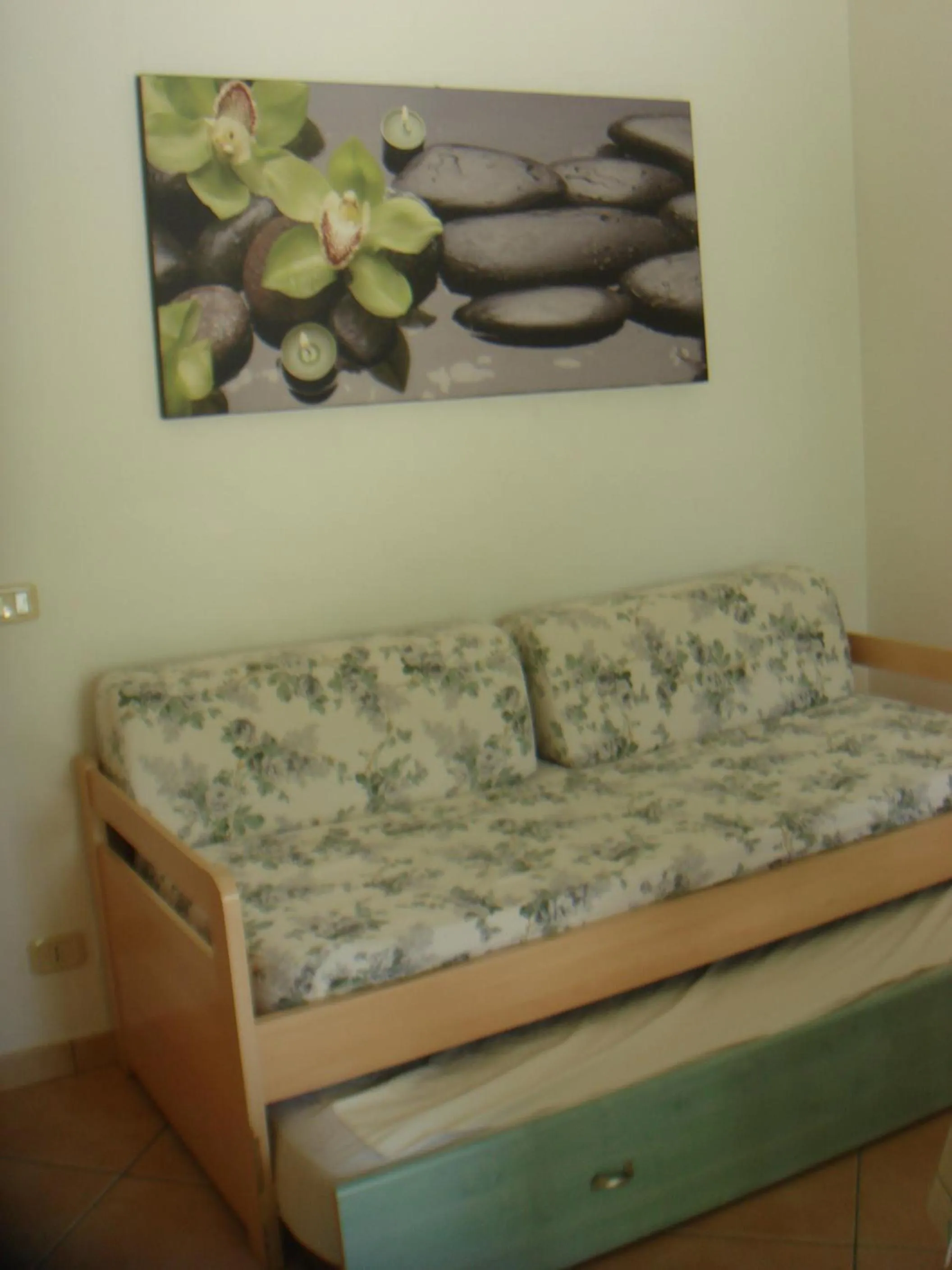 Living room, Bed in Argeste Club Vacanze