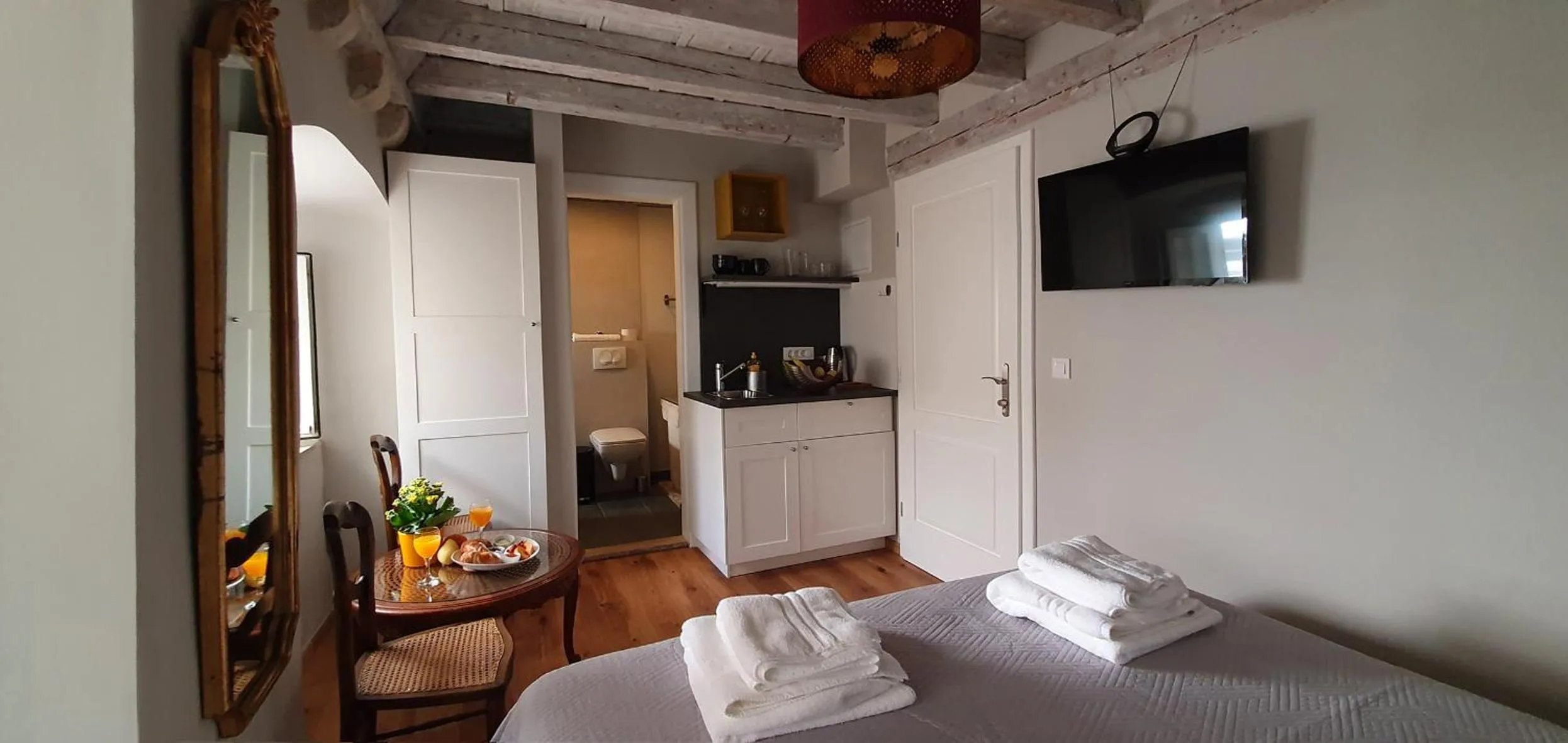 Bed in Muziqa Apartments