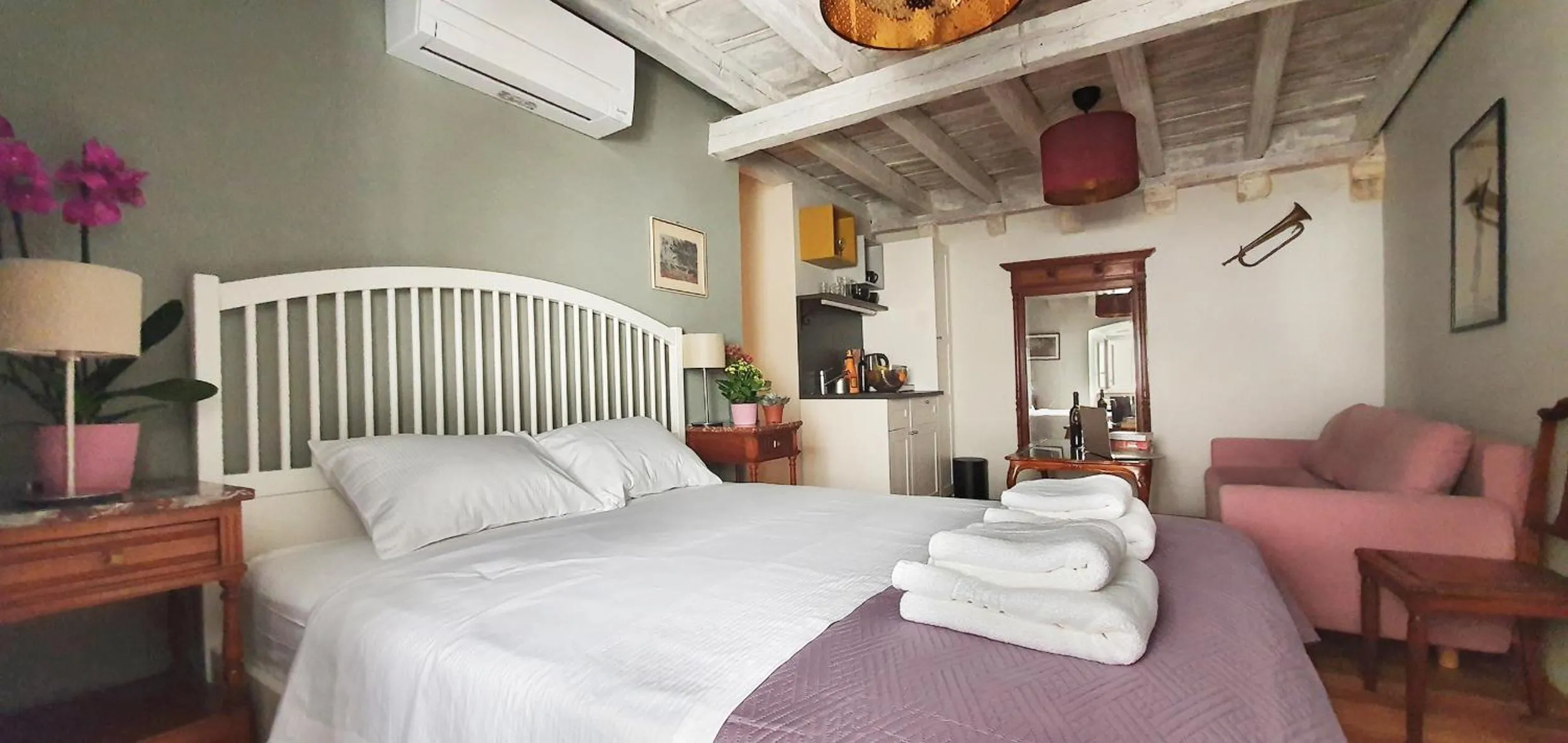 Bed in Muziqa Apartments