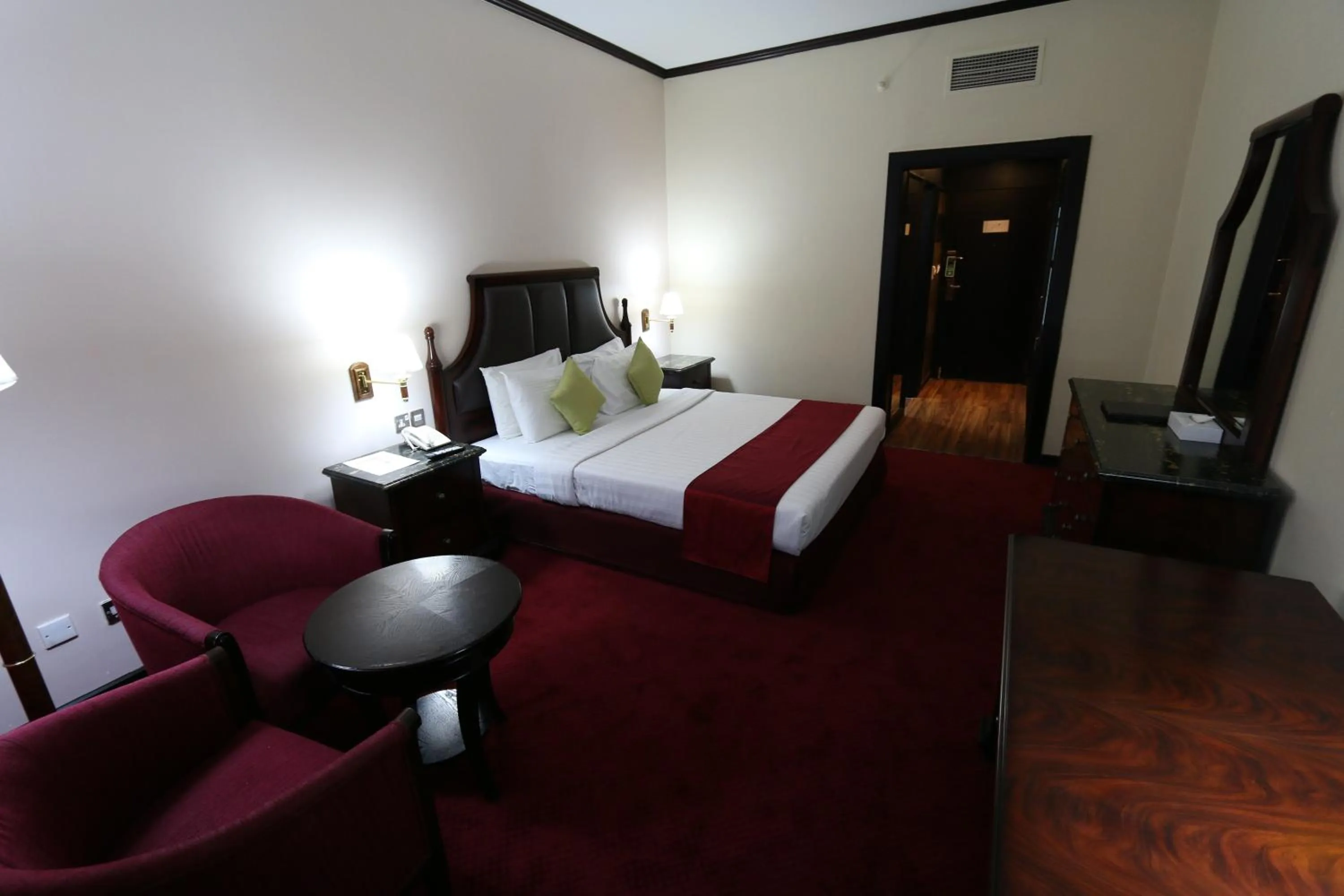 Bed in Grand Mayfair Hotel