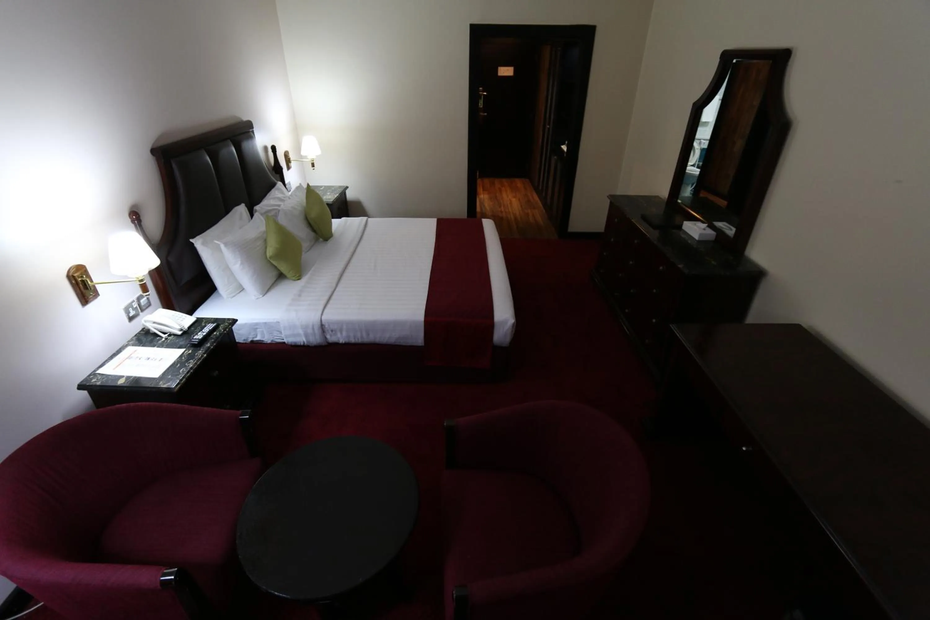 Bed in Grand Mayfair Hotel