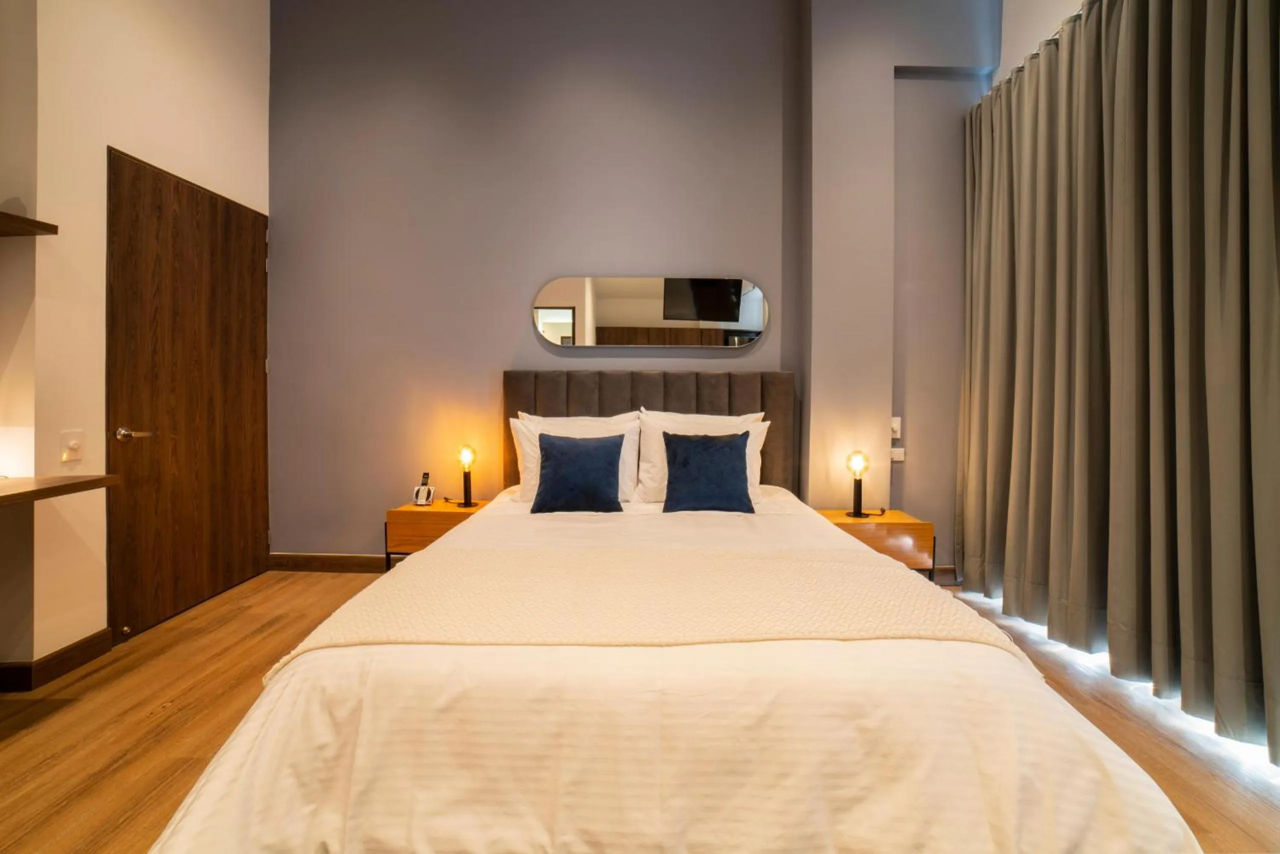 Bed in Cali River Suites by Yellowkey Capital