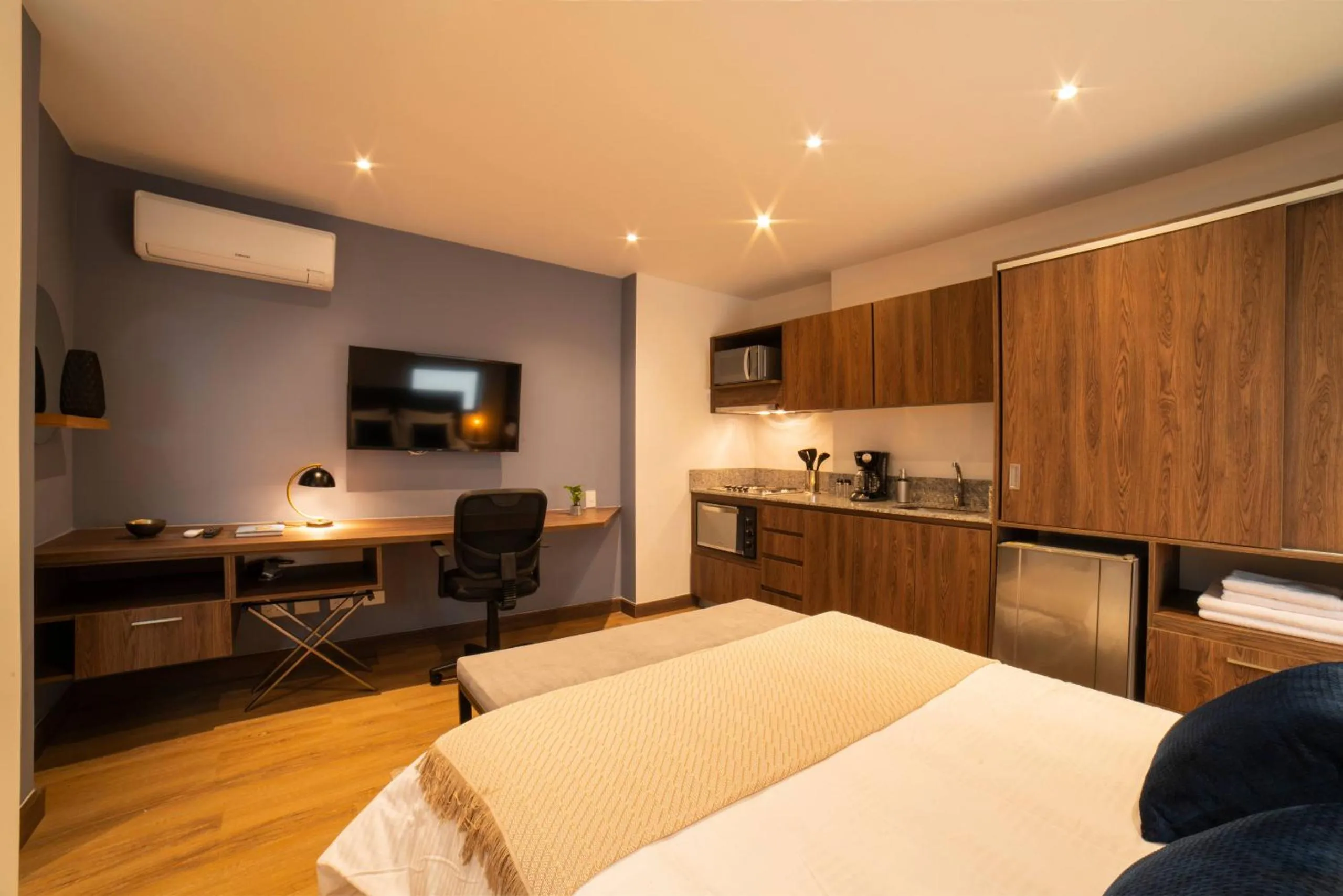 Bed in Cali River Suites by Yellowkey Capital