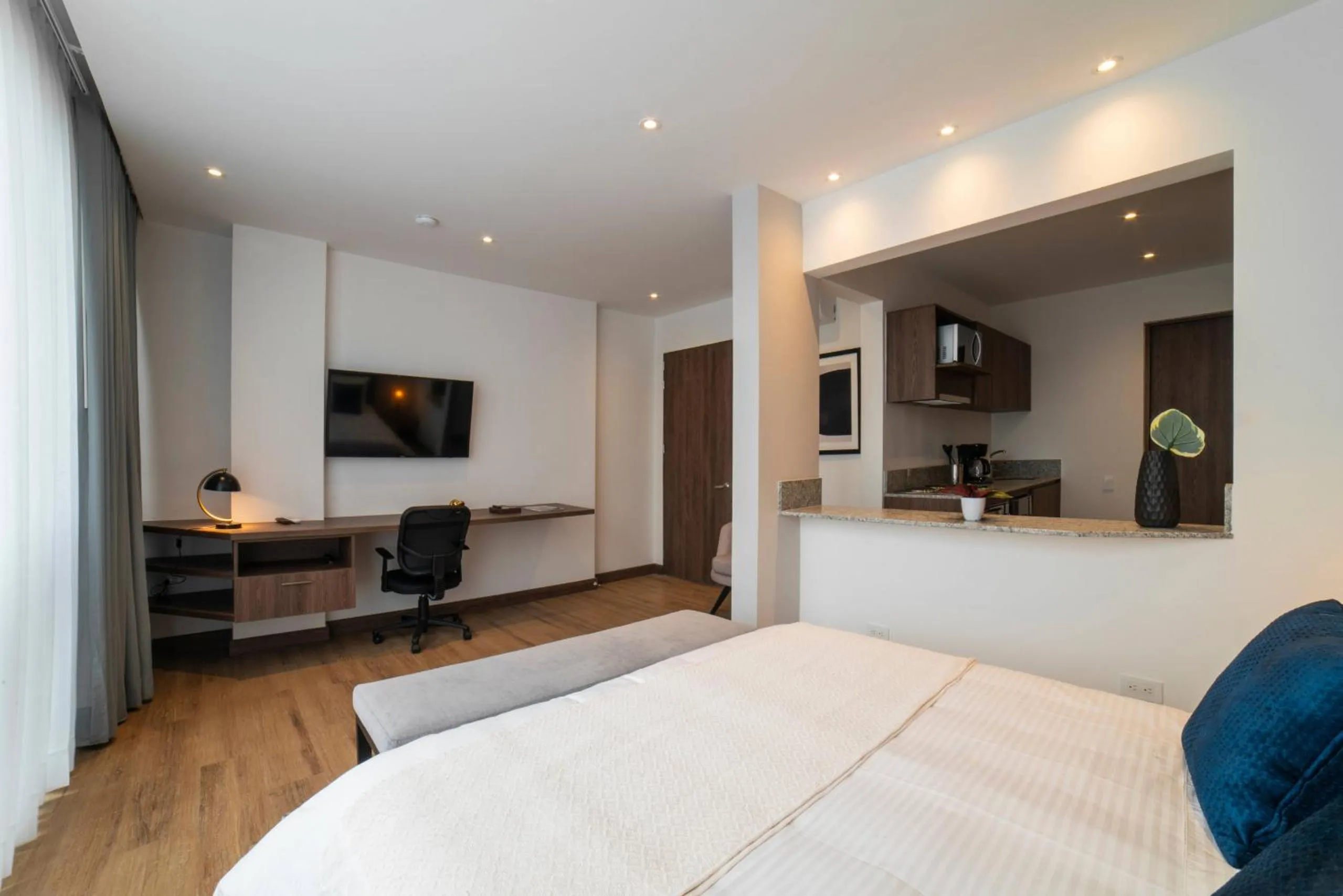 Bed in Cali River Suites by Yellowkey Capital