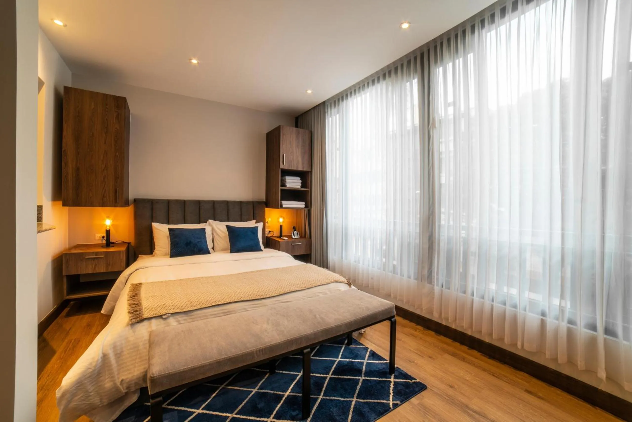 Bed in Cali River Suites by Yellowkey Capital