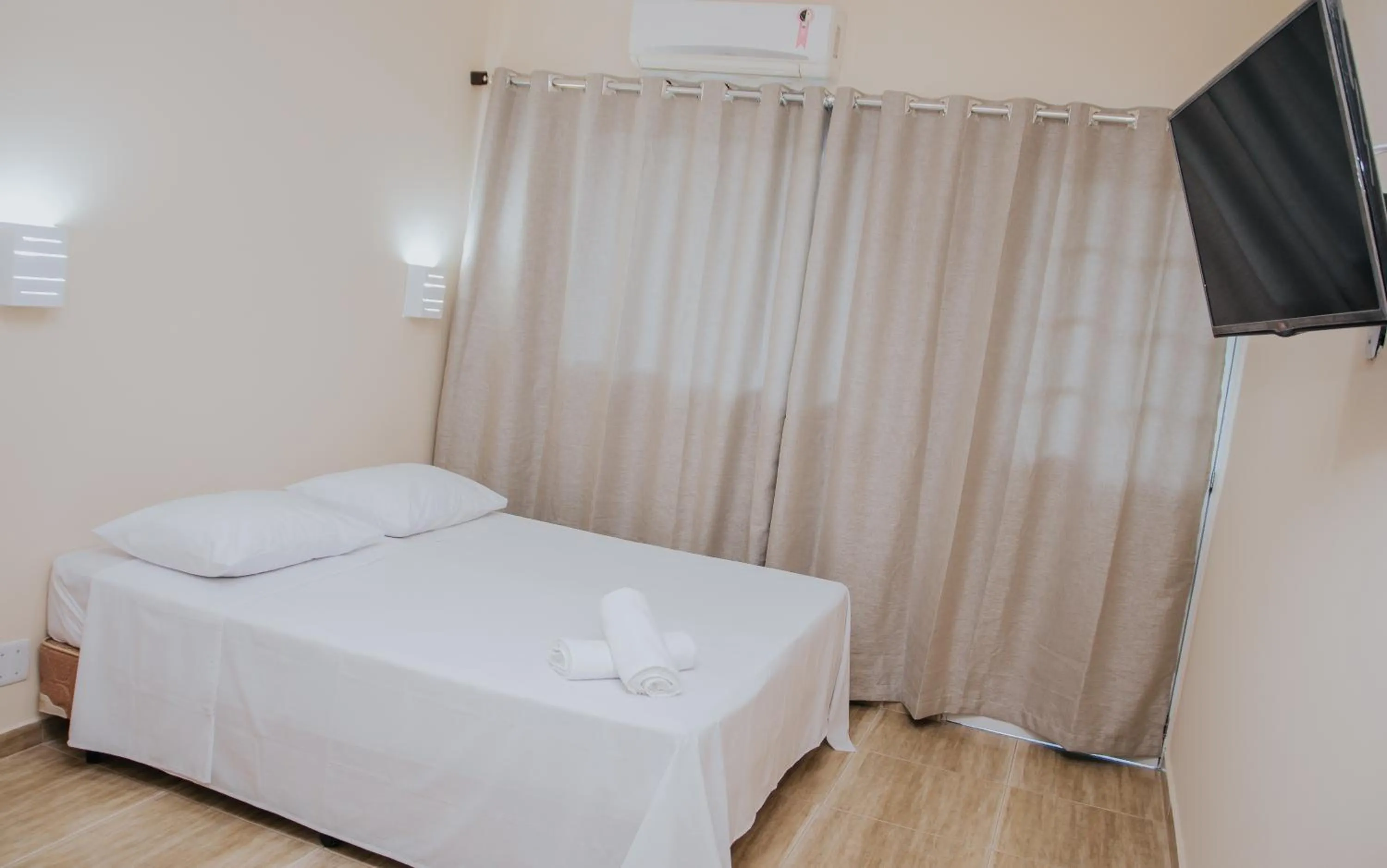 Bed in Pousada La Brisa