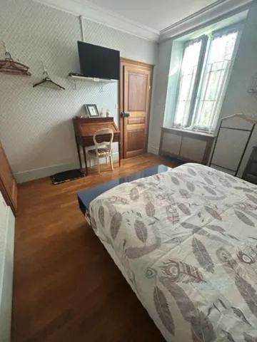 Bed in Chambres d'hôtes dans une maison de caractère