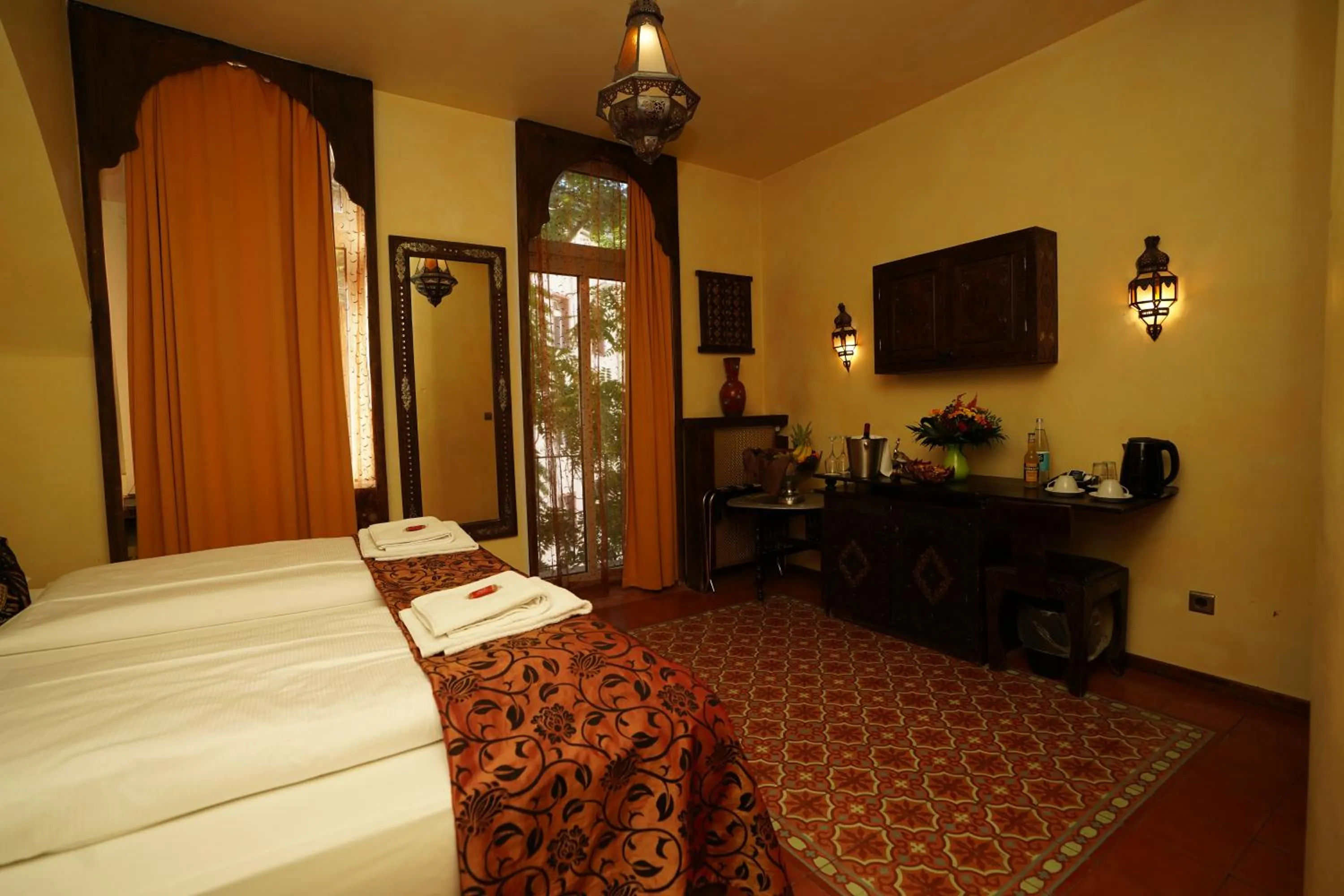 TV/Entertainment Center in Hotel Villa Oriental & Restaurant                                               