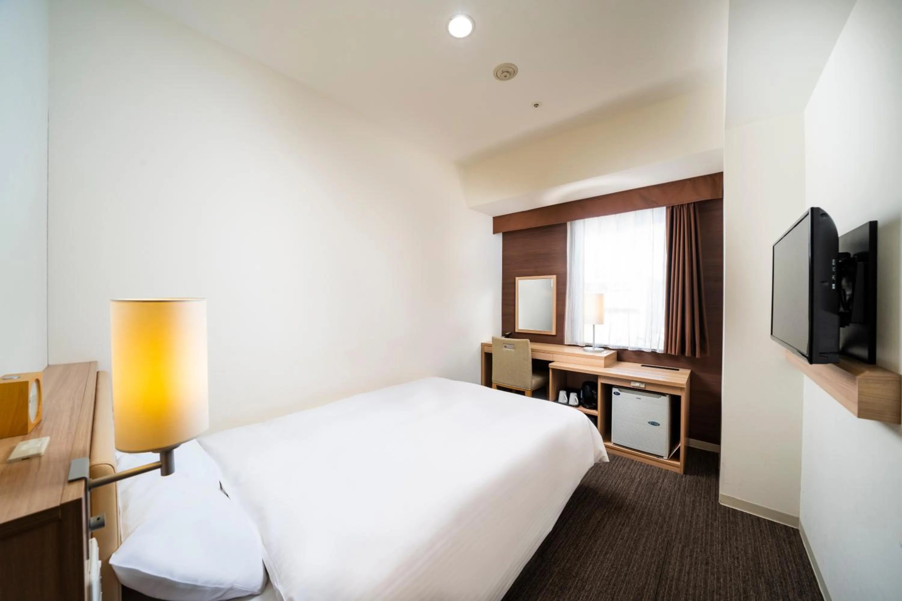 Photo of the whole room, Bed in KOKO HOTEL Sapporo Ekimae