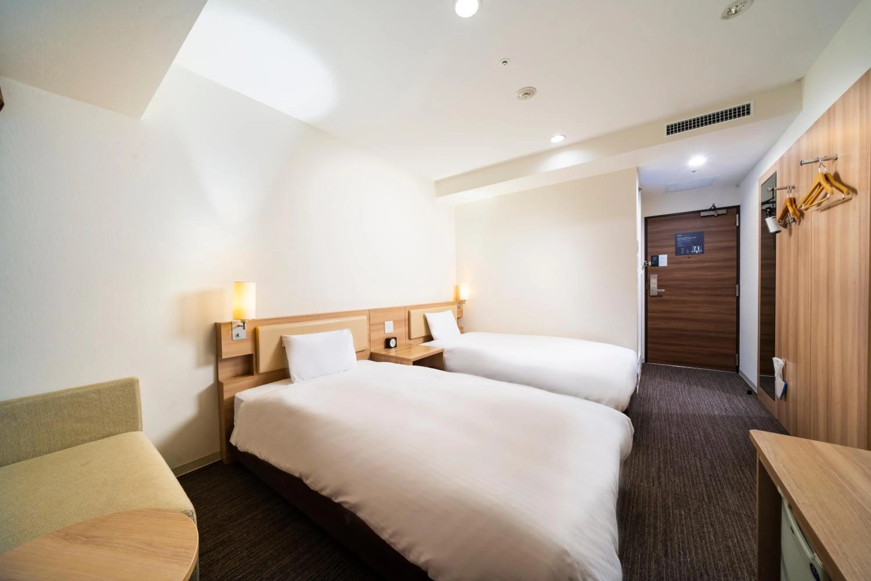 Photo of the whole room, Bed in KOKO HOTEL Sapporo Ekimae