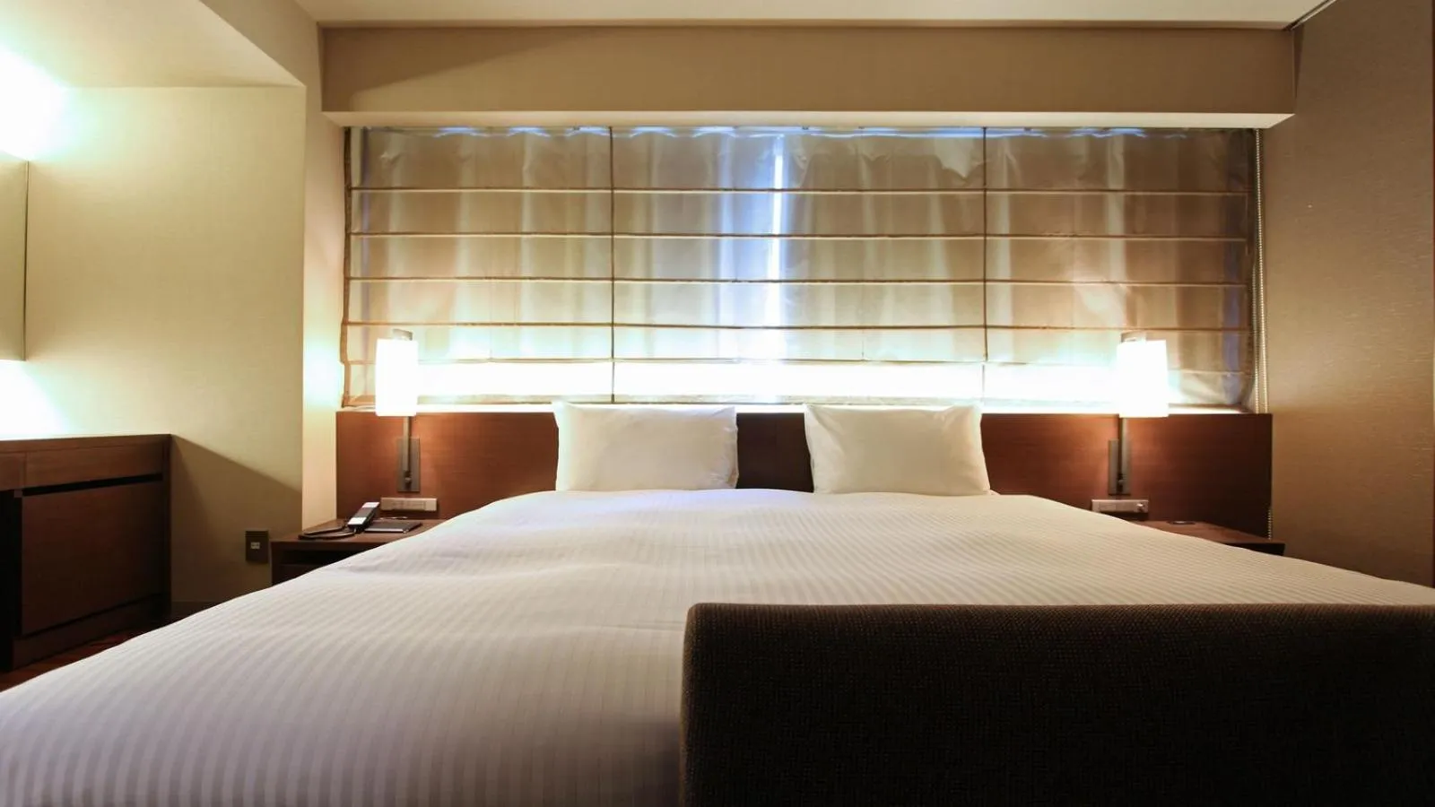 Bed in KOKO HOTEL Fukuoka Tenjin