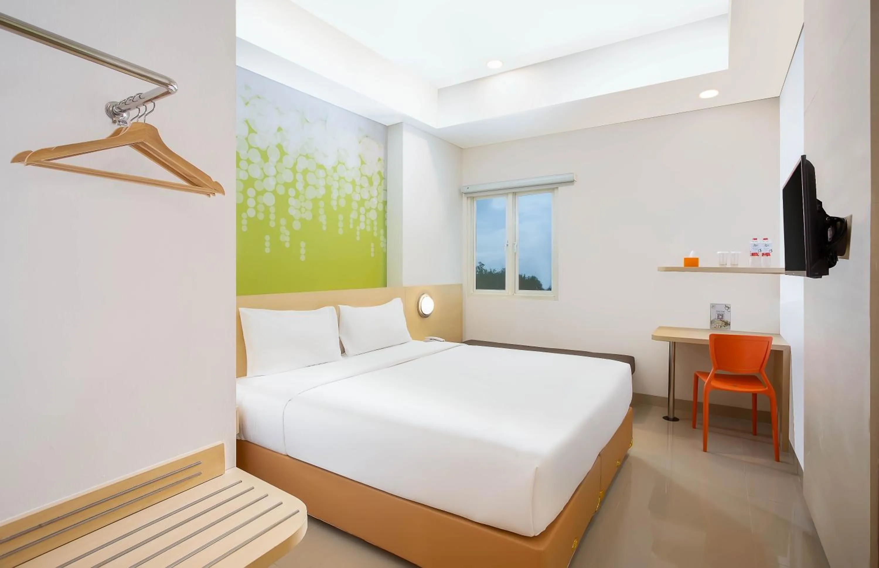 Bed in Zest Parang Raja Solo by Swiss-Belhotel International