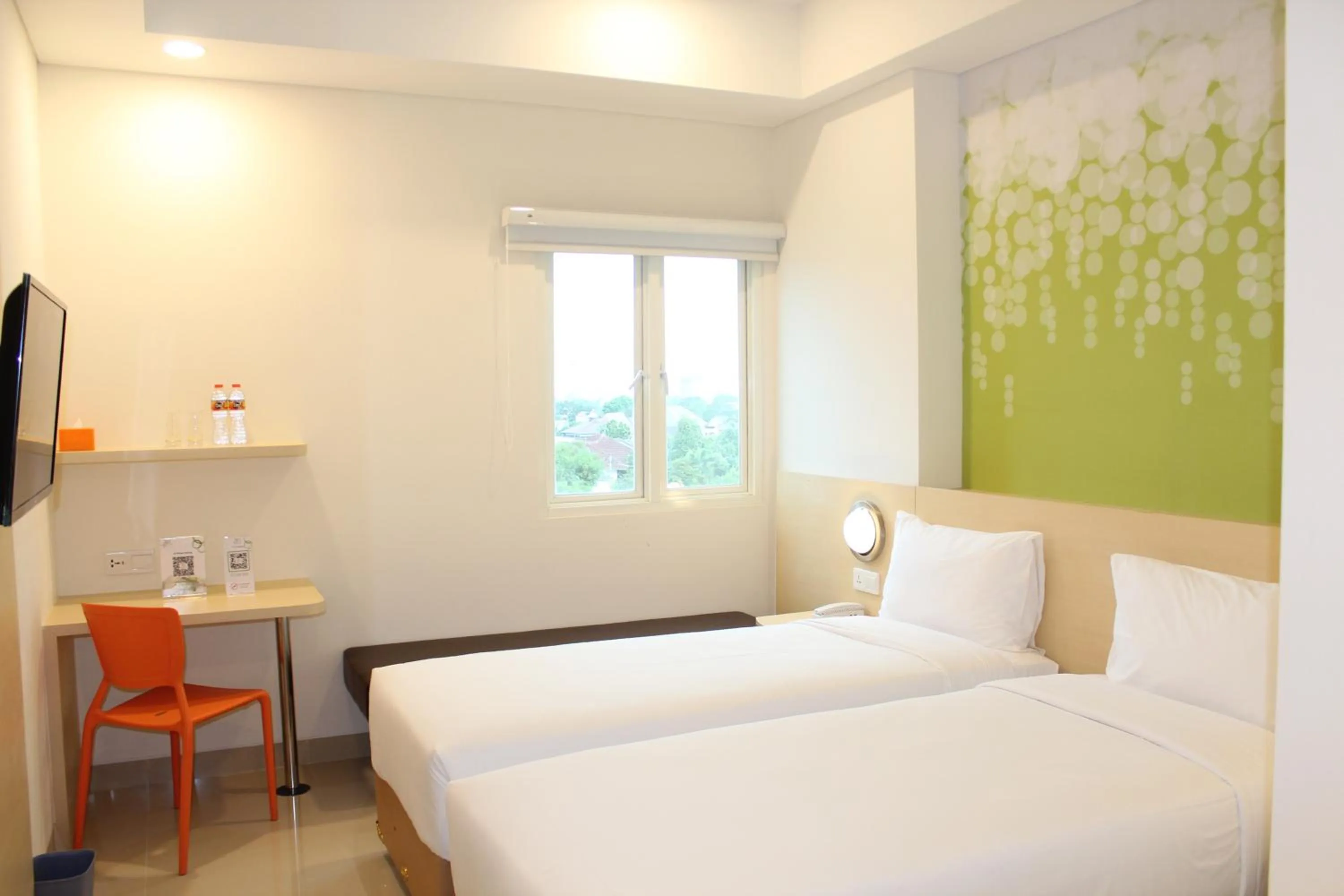 Bedroom, Bed in Zest Parang Raja Solo by Swiss-Belhotel International