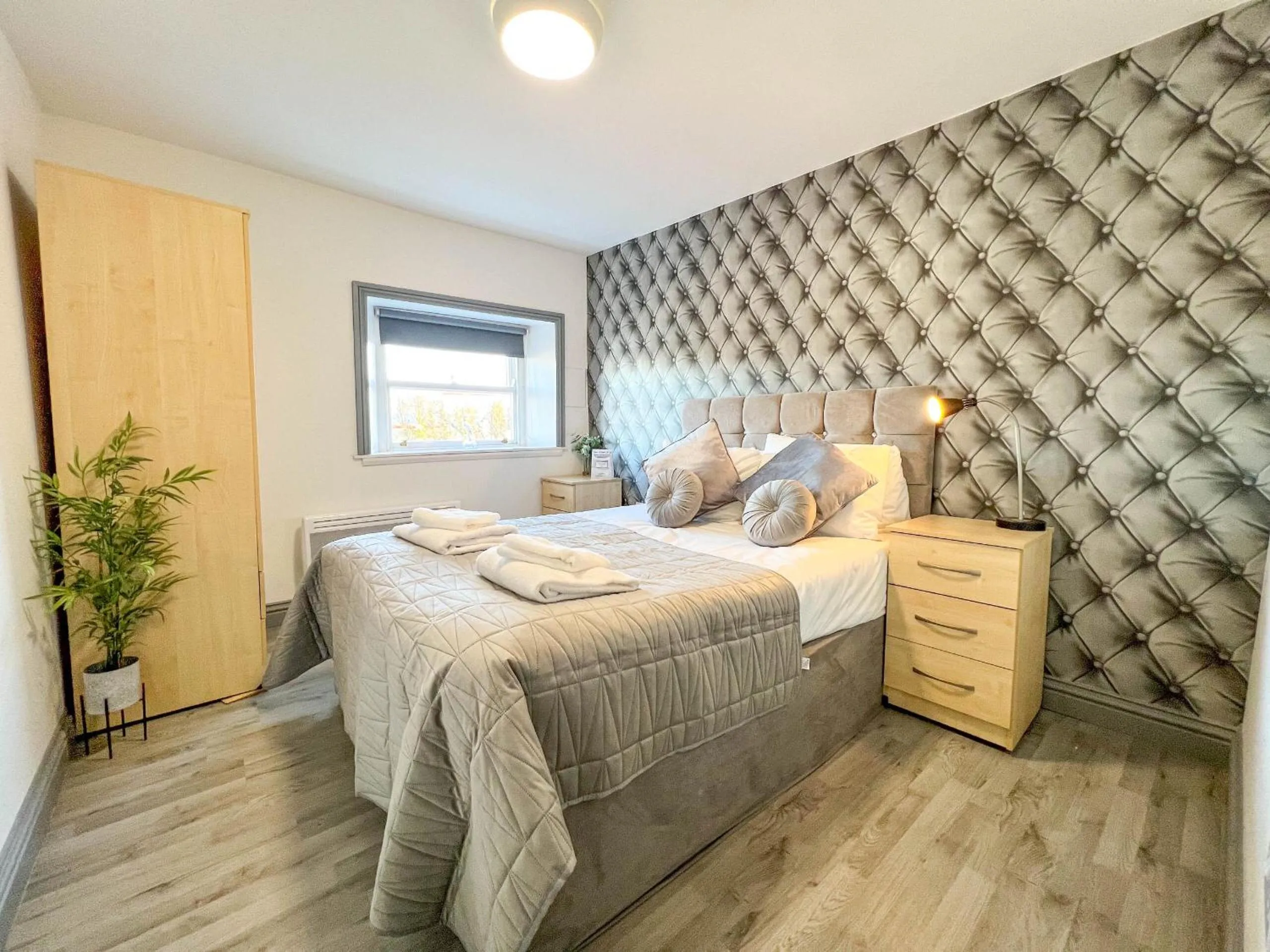 Bedroom in The Quayside Apartment Hotel