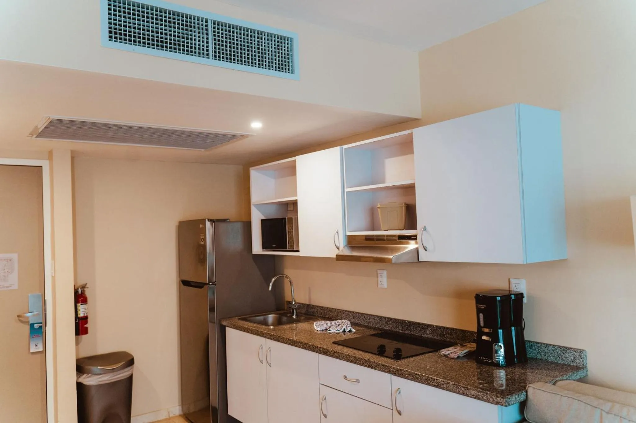 kitchen in The Mill Resort and Suites