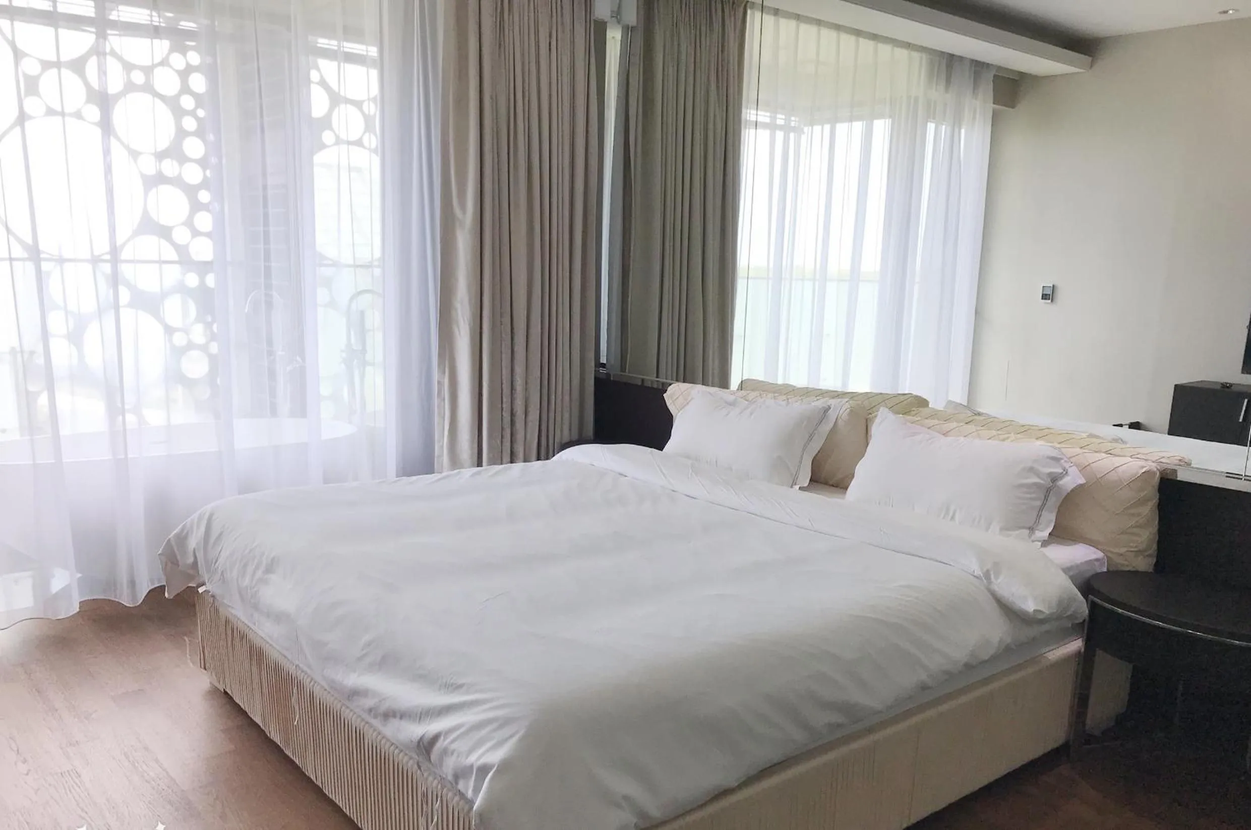 Bed in Ocean Star Condominium