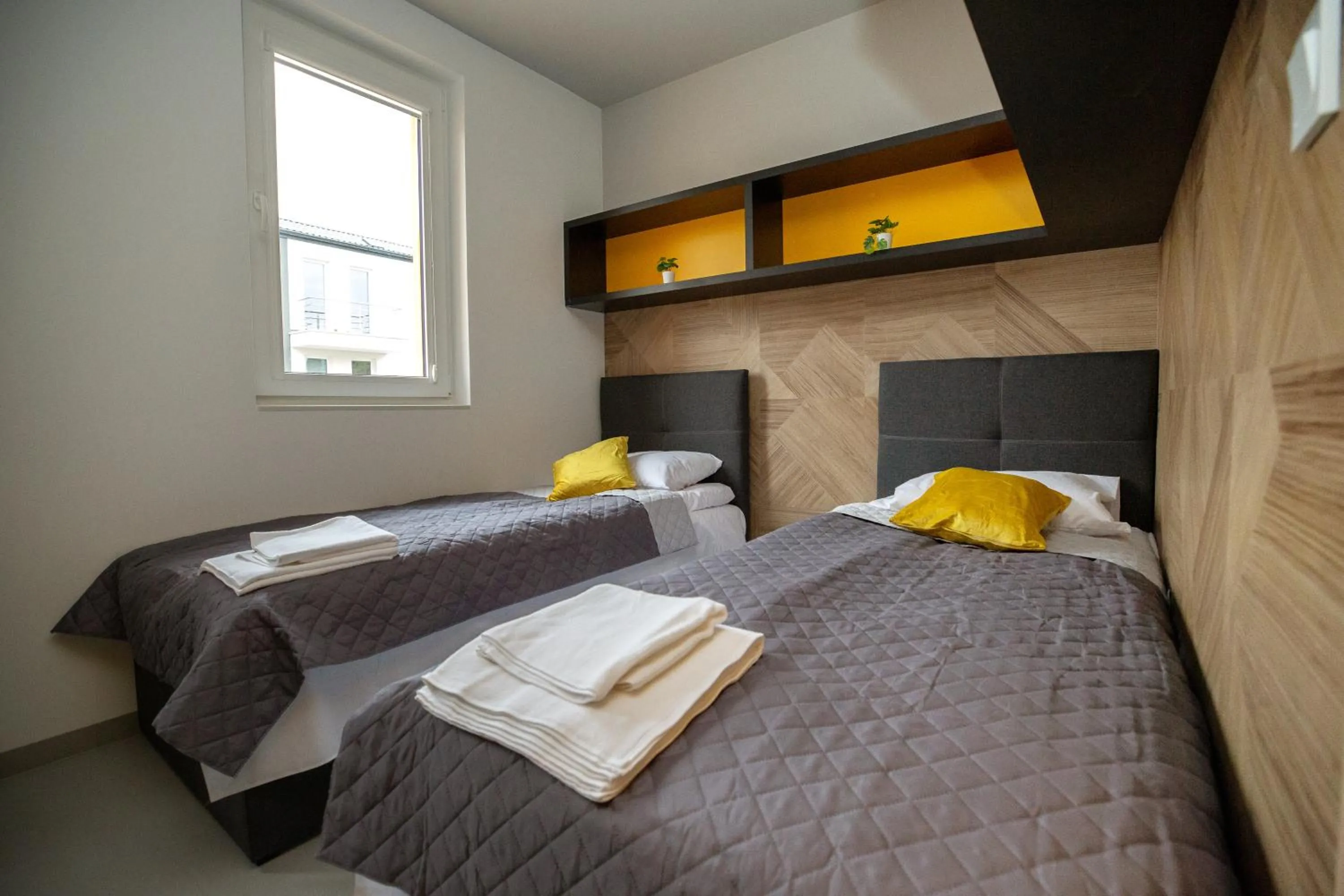 Photo of the whole room, Bed in iroom