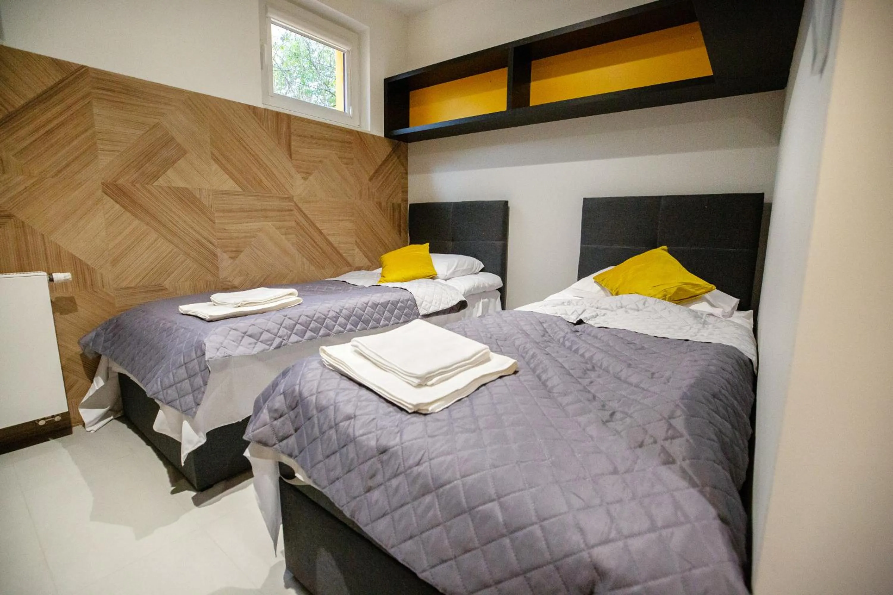 Photo of the whole room, Bed in iroom