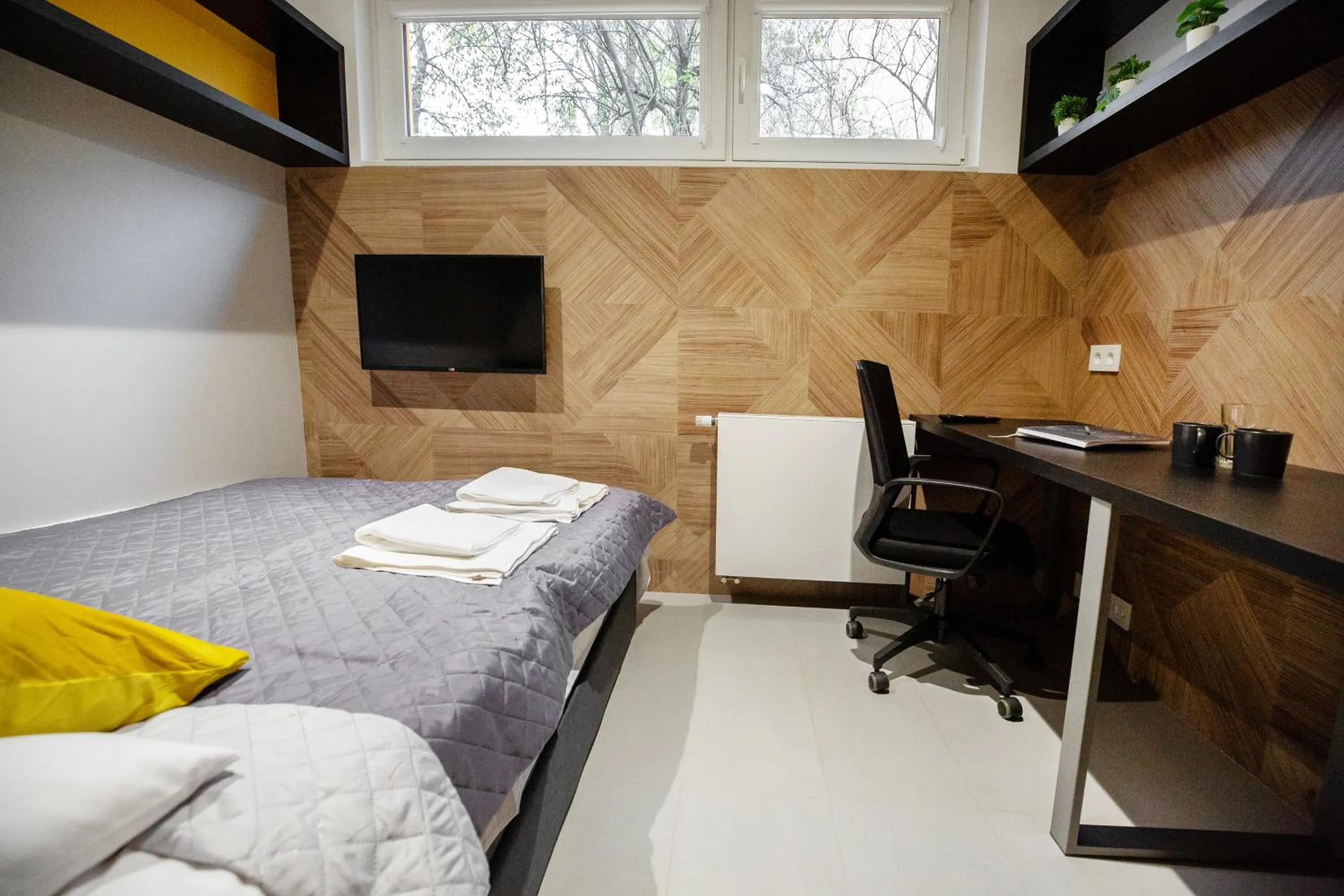 Photo of the whole room, Bed in iroom